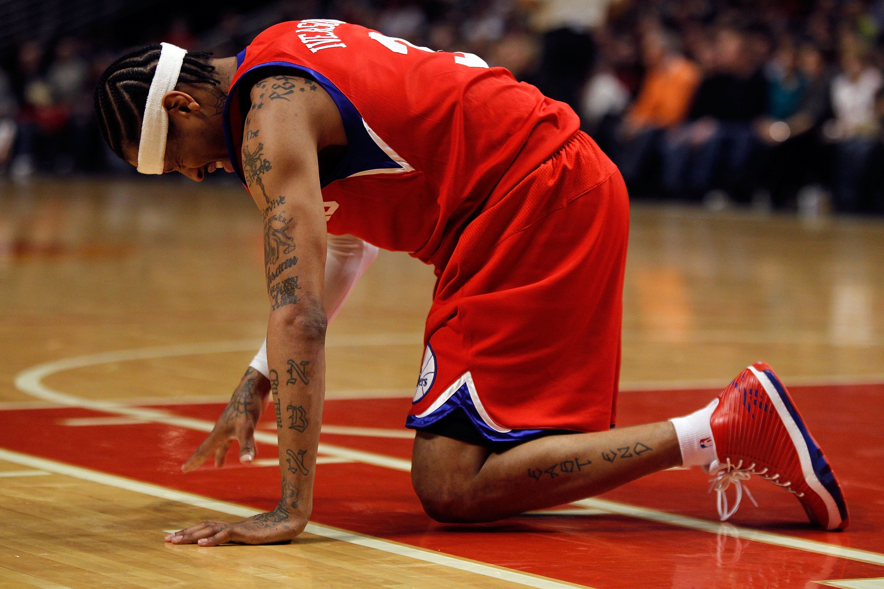 CHICAGO - FEBRUARY 20: Allen Iverson #3 of the Philadelphia 76ers is slow to get up after being hit in the face during a game against the Chicago Bulls at the United Center on February 20, 2010 in Chicago, Illinois. The Bulls defeated the 76ers 122-90. NO