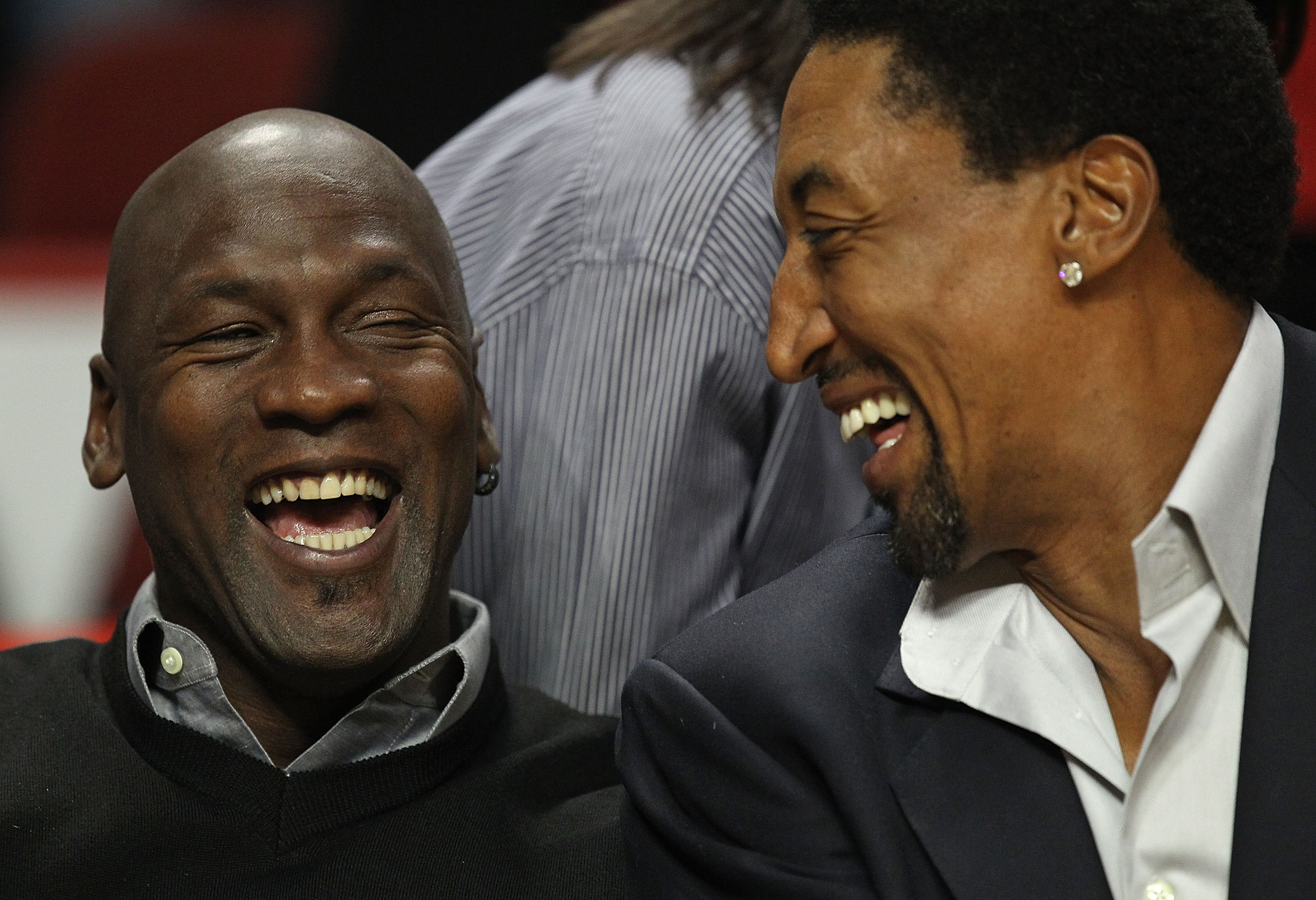 CHICAGO, IL - FEBRUARY 15: Former players Michael Jordan and Scottie Pippen of the Chicago Bulls share a laugh before a game between the Bulls and the Charlotte Bobcats at the United Center on February 15, 2011 in Chicago, Illinois. NOTE TO USER: User exp
