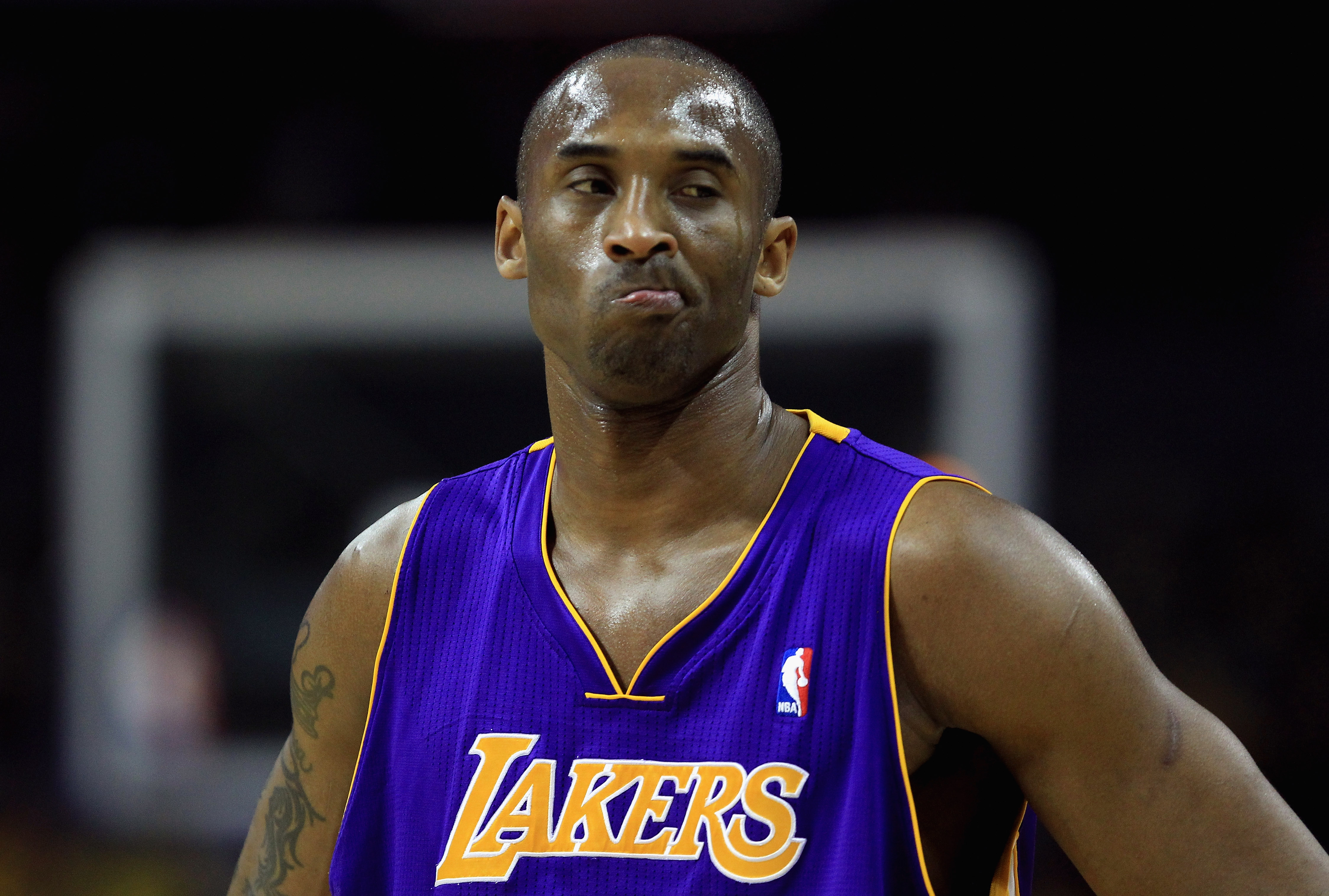 CHARLOTTE, NC - FEBRUARY 14:  Kobe Bryant #24 of the Los Angeles Lakers reacts to the bench against the Charlotte Bobcats during their game at Time Warner Cable Arena on February 14, 2011 in Charlotte, North Carolina. NOTE TO USER: User expressly acknowle