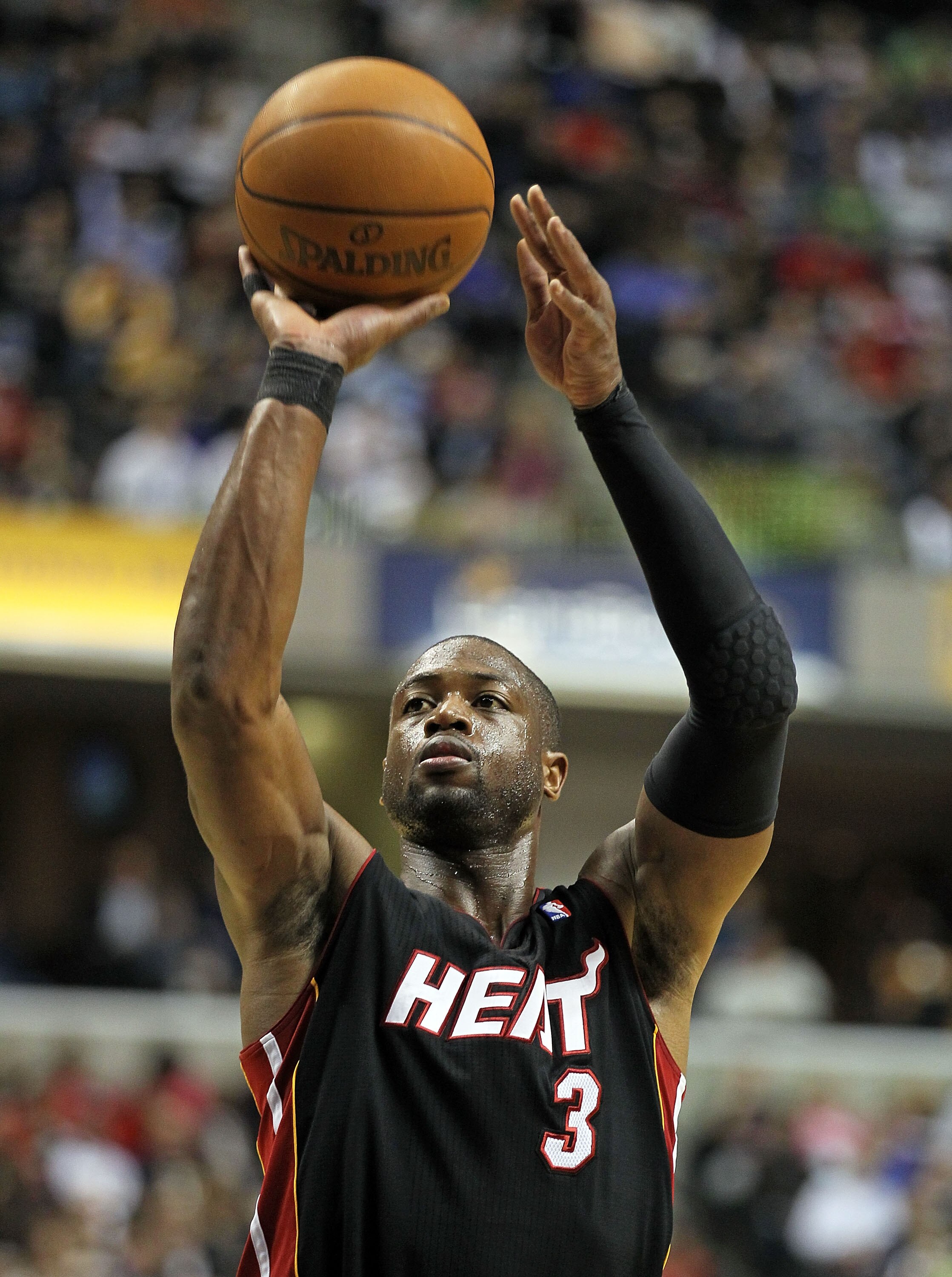 INDIANAPOLIS - FEBRUARY 15:  Dwyane Wade #3 of the Miami Heat shoots the ball during the NBA game against the Indiana Pacers at Conseco Fieldhouse on February 15, 2011 in Indianapolis, Indiana.   The Heat won 110-103.   NOTE TO USER: User expressly acknow