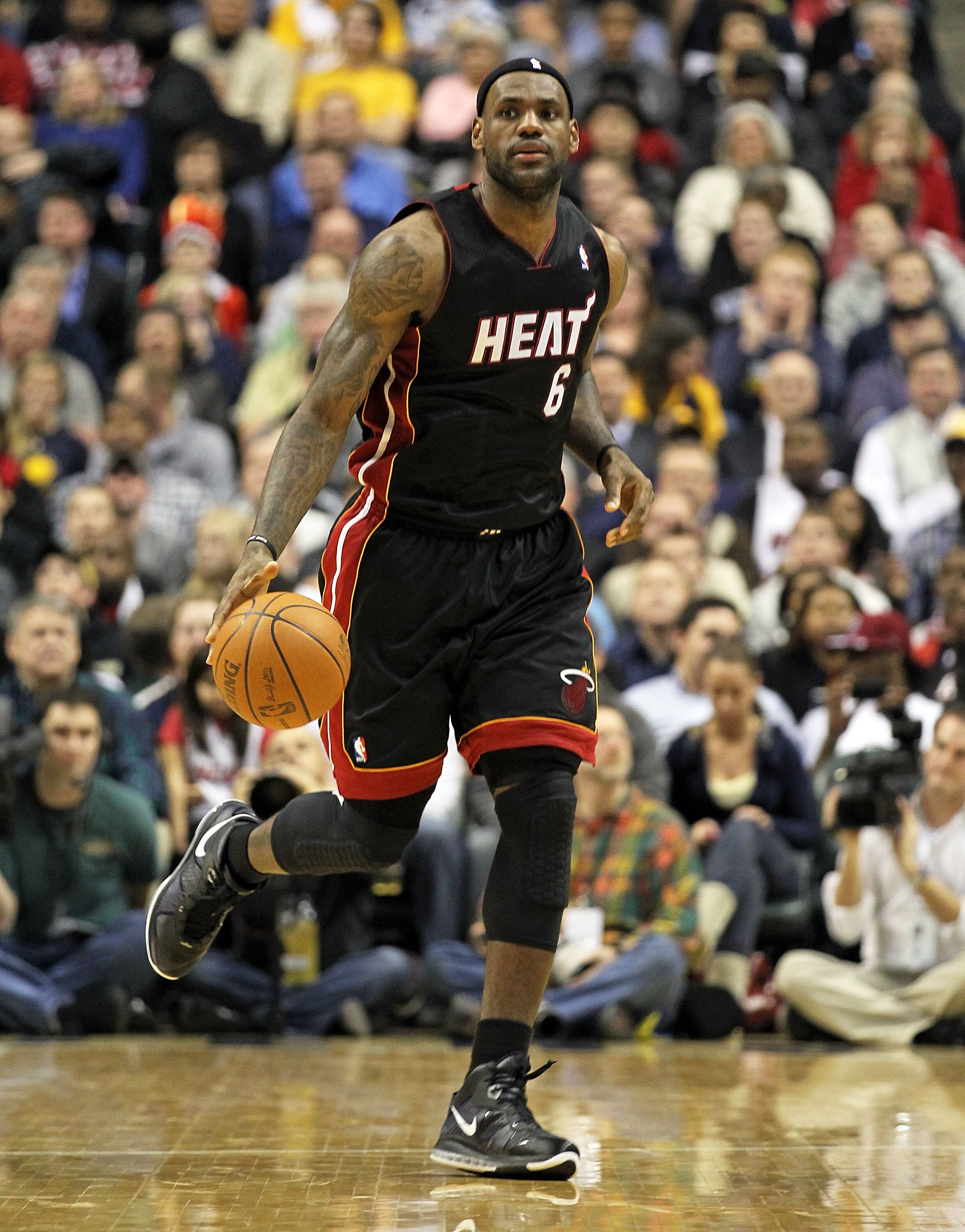 INDIANAPOLIS - FEBRUARY 15:  LeBron James #6 of the Miami Heat dribbbles the ball during the NBA game against the Indiana Pacers at Conseco Fieldhouse on February 15, 2011 in Indianapolis, Indiana.   The Heat won 110-103.   NOTE TO USER: User expressly ac