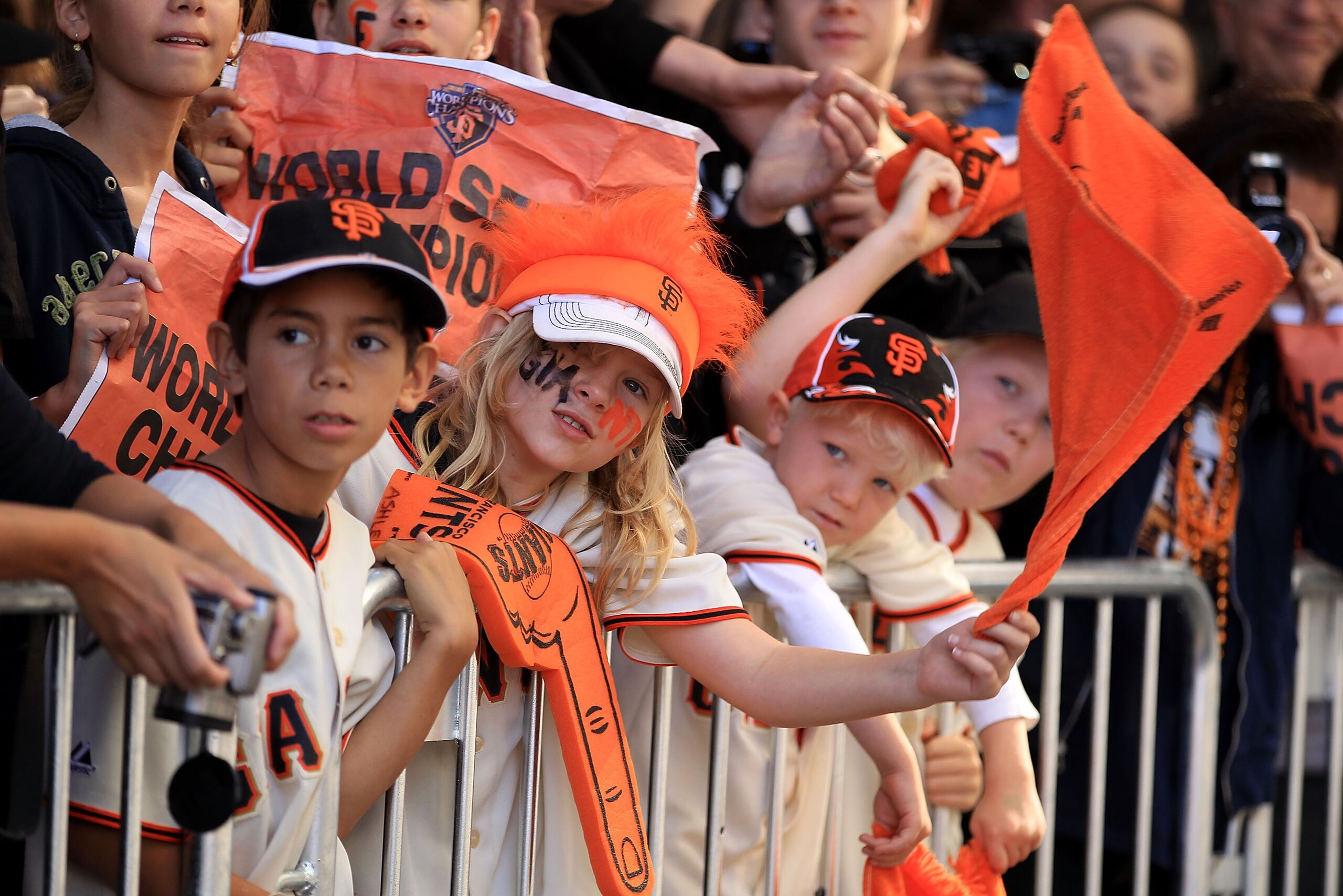 SAN FRANCISCO - NOVEMBER 03:  Fans line the streets to cheer on their team during the San Francisco Giants victory parade on November 3, 2010 in San Francisco, California.  (Photo by Ezra Shaw/Getty Images)
