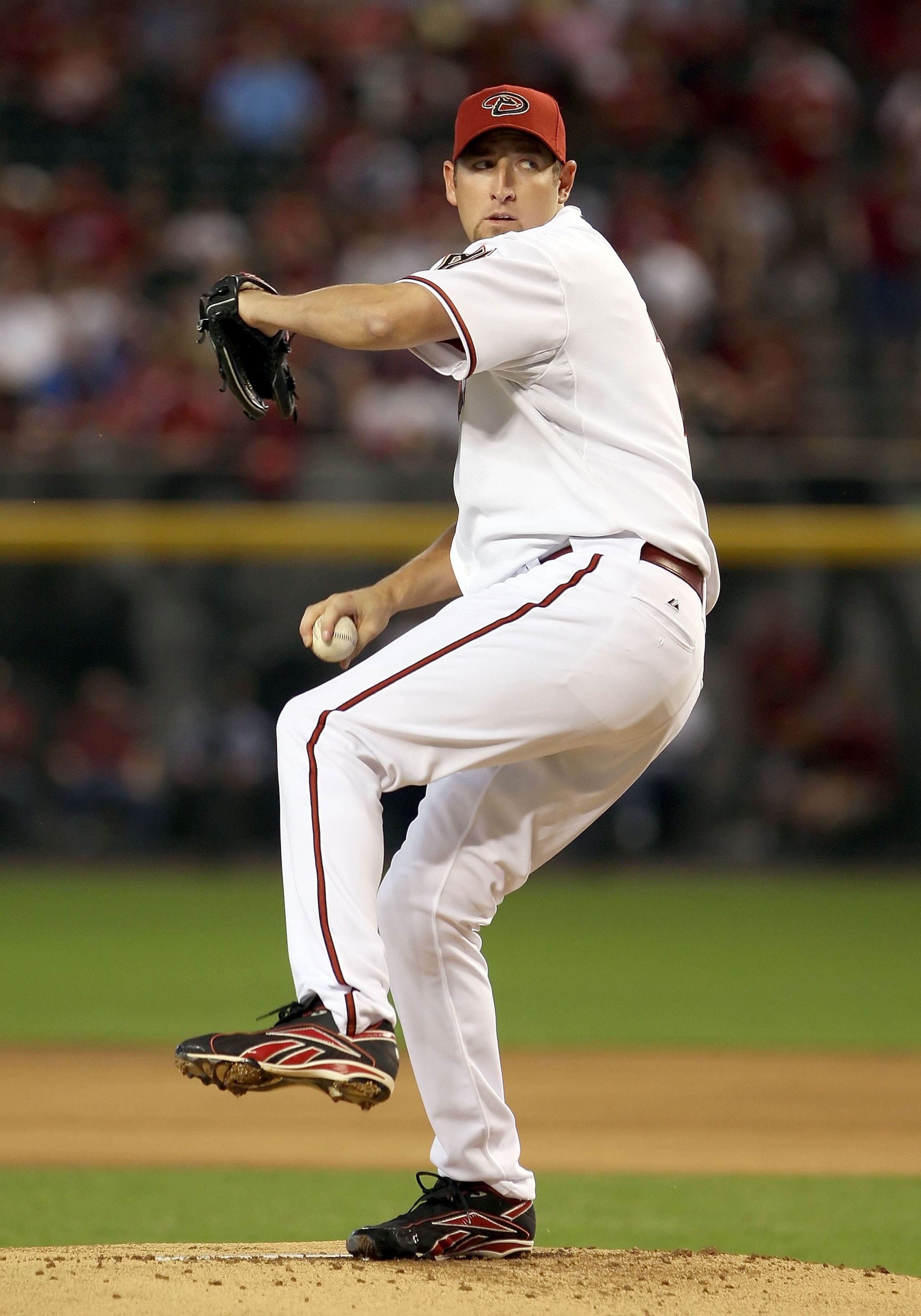 PHOENIX - APRIL 06: Starting pitcher Brandon Webb #17 of the Arizona Diamondbacks pitches against the Colorado Rockies during the MLB openning day game at Chase Field on April 6, 2009 in Phoenix, Arizona. The Diamondbacks defeated the Rockies 9-8. (Pho PHOENIX - APRIL 06: Starting pitcher Brandon Webb #17 of the Arizona Diamondbacks pitches against the Colorado Rockies during the MLB openning day game at Chase Field on April 6, 2009 in Phoenix, Arizona. The Diamondbacks defeated the Rockies 9-8. (Pho