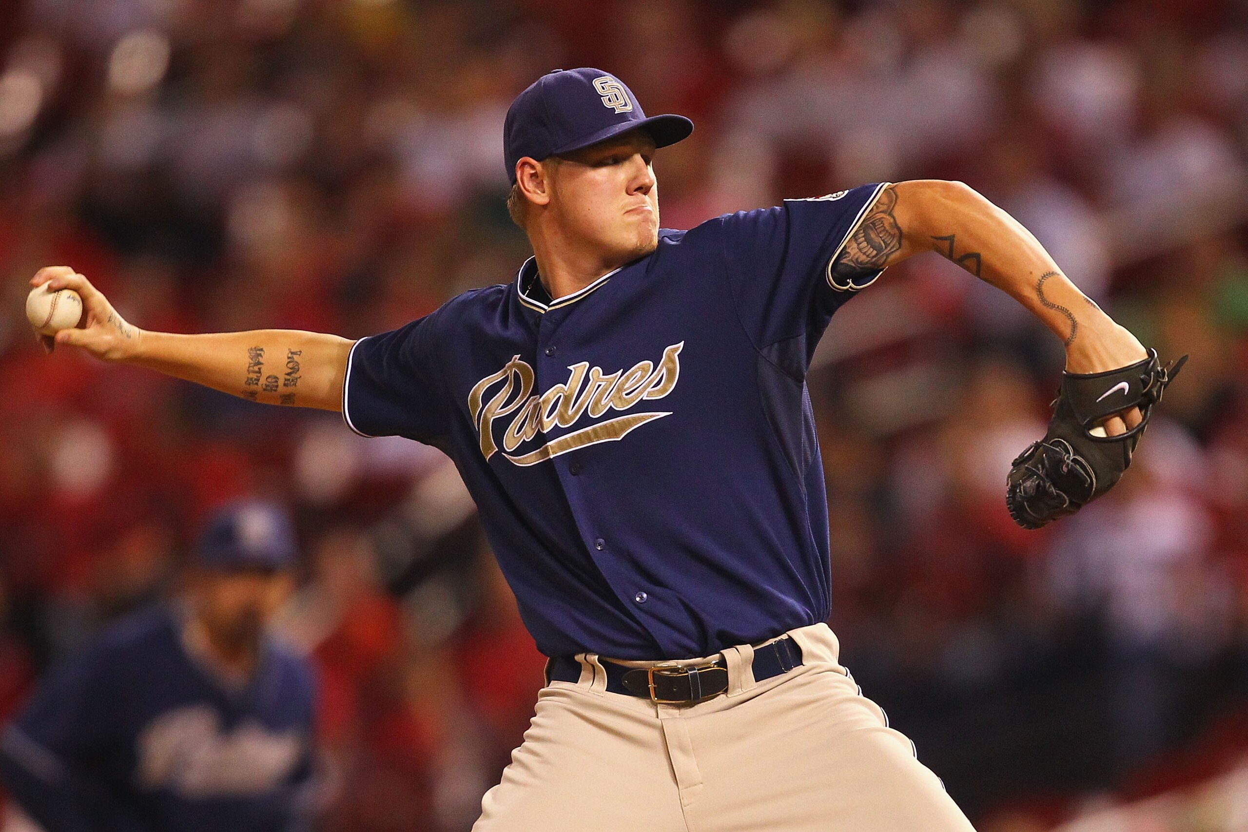 ST. LOUIS - SEPTEMBER 17: Starter Matt Latos #38 of the San Diego Padres pitches against the St. Louis Cardinals at Busch Stadium on September 17, 2010 in St. Louis, Missouri. (Photo by Dilip Vishwanat/Getty Images) ST. LOUIS - SEPTEMBER 17: Starter Matt Latos #38 of the San Diego Padres pitches against the St. Louis Cardinals at Busch Stadium on September 17, 2010 in St. Louis, Missouri. (Photo by Dilip Vishwanat/Getty Images)