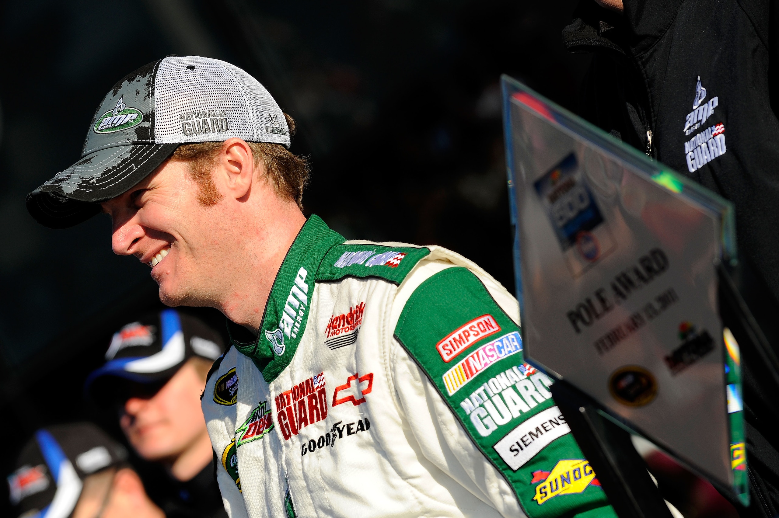 DAYTONA BEACH, FL - FEBRUARY 13:  Pole award winner Dale Earnhardt Jr., driver of the #88 National Guard/AMP Energy Chevrolet, poses in victory lane after qualifying for the NASCAR Sprint Cup Series Daytona 500 at Daytona International Speedway on Februar
