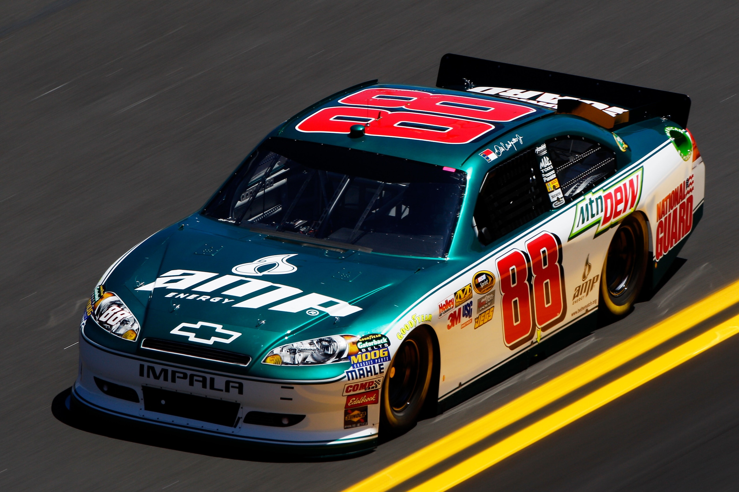 DAYTONA BEACH, FL - FEBRUARY 12:  Dale Earnhardt Jr., driver of the #88 National Guard/AMP Energy Chevrolet, practices for the NASCAR Sprint Cup Series Daytona 500 at Daytona International Speedway on February 12, 2011 in Daytona Beach, Florida.  (Photo b