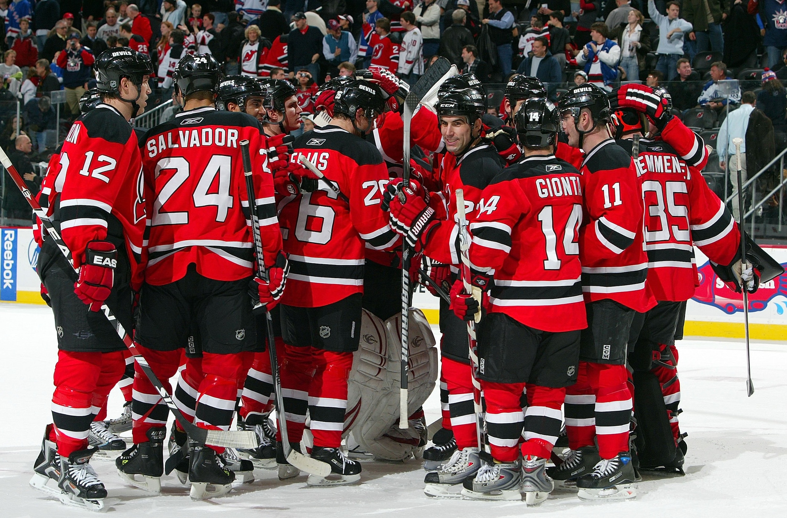 NEWARK, NJ - DECEMBER 12:  The New Jersey Devils celebrate against the New York Rangers at the Prudential Center on December 12, 2008 in Newark, New Jersey. The Devils defeated the Rangers 8-5.  (Photo by Jim McIsaac/Getty Images)