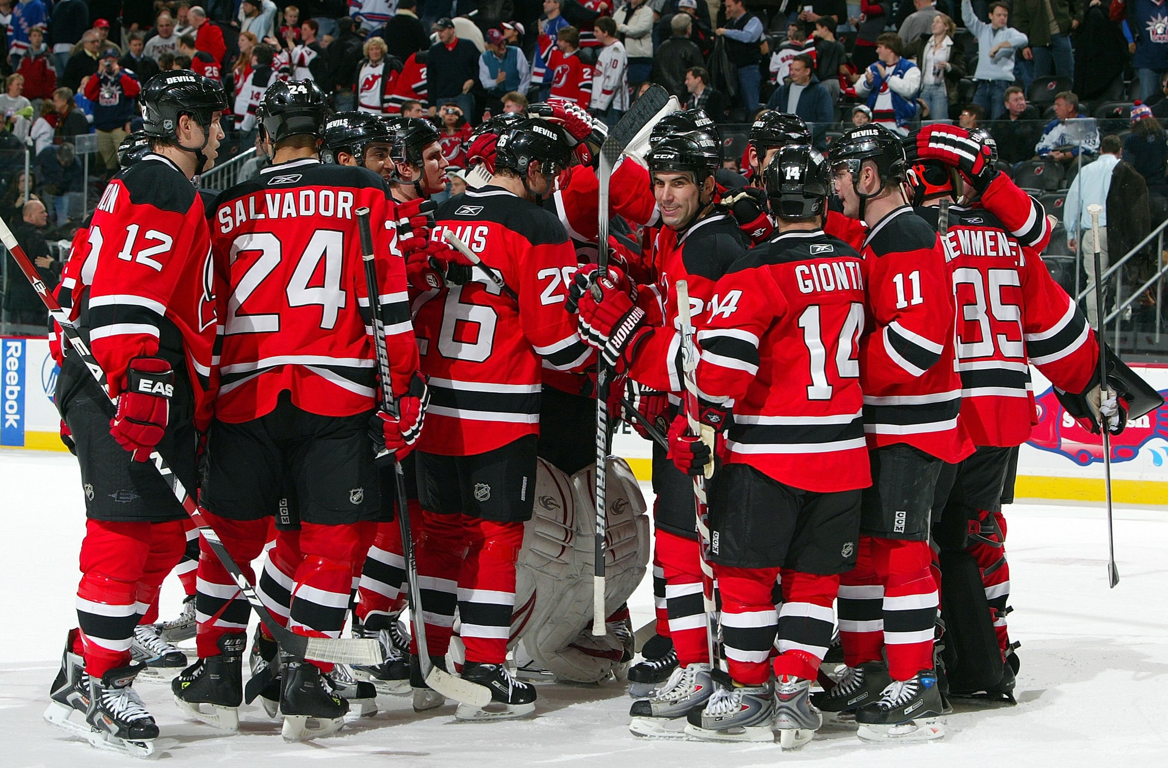 NEWARK, NJ - DECEMBER 12:  The New Jersey Devils celebrate against the New York Rangers at the Prudential Center on December 12, 2008 in Newark, New Jersey. The Devils defeated the Rangers 8-5.  (Photo by Jim McIsaac/Getty Images)