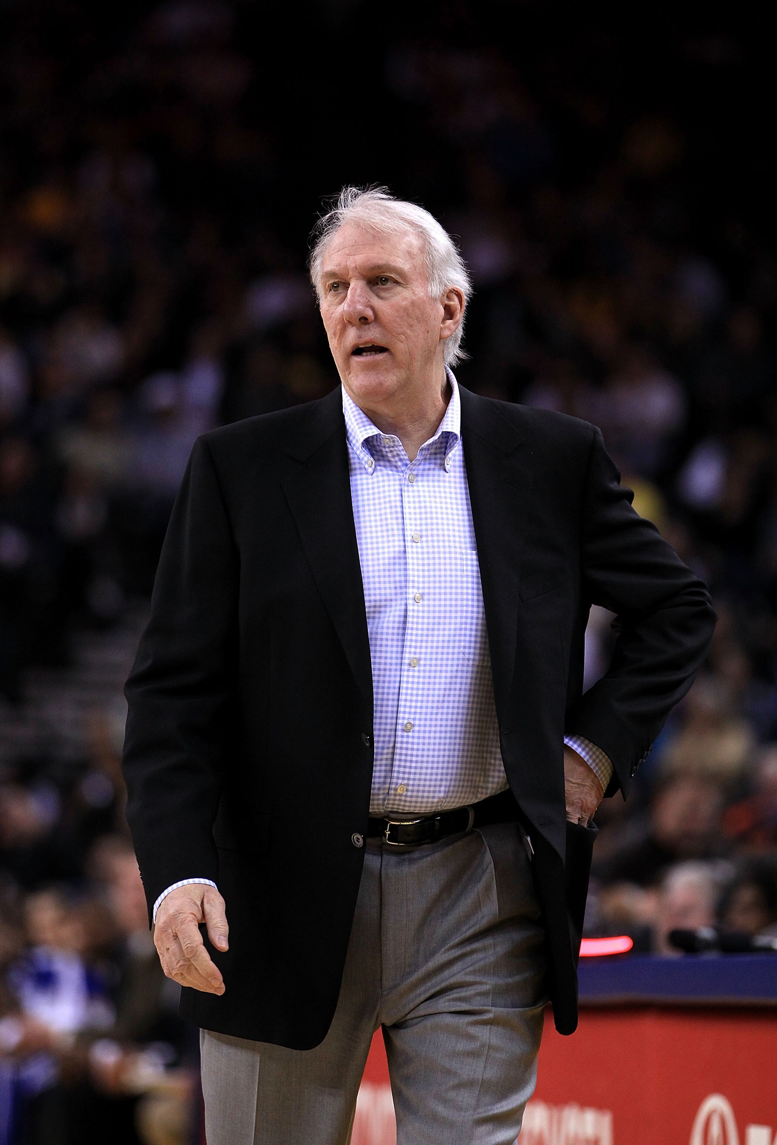 OAKLAND, CA - JANUARY 24: Gregg Popovich of the San Antonio Spurs walks the sideline during their game against the Golden State Warriors at Oracle Arena on January 24, 2011 in Oakland, California. NOTE TO USER: User expressly acknowledges and agrees tha OAKLAND, CA - JANUARY 24: Gregg Popovich of the San Antonio Spurs walks the sideline during their game against the Golden State Warriors at Oracle Arena on January 24, 2011 in Oakland, California. NOTE TO USER: User expressly acknowledges and agrees tha