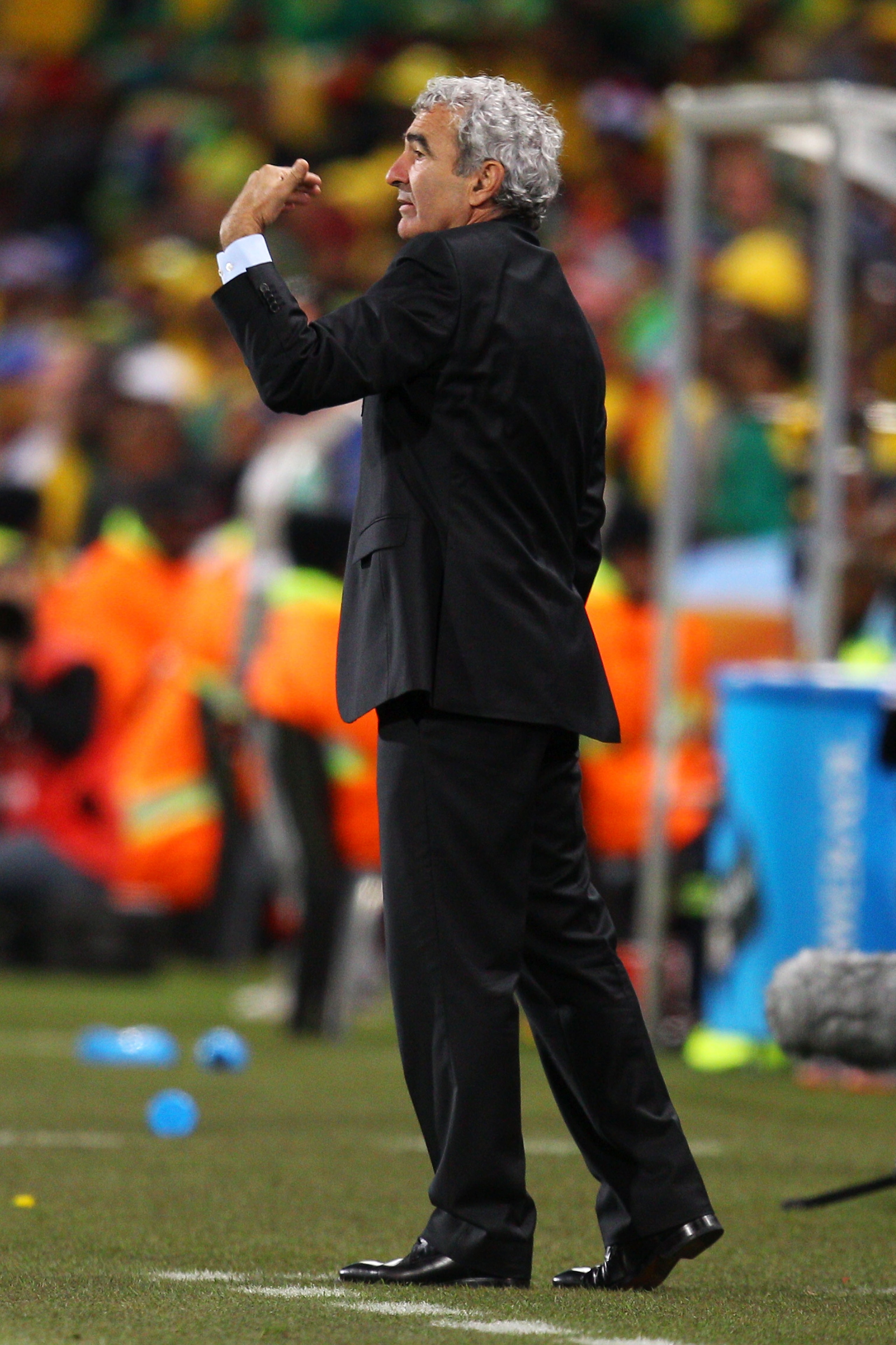 BLOEMFONTEIN, SOUTH AFRICA - JUNE 22:  Raymond Domenech head coach of France directs his players during the 2010 FIFA World Cup South Africa Group A match between France and South Africa at the Free State Stadium on June 22, 2010 in Mangaung/Bloemfontein,