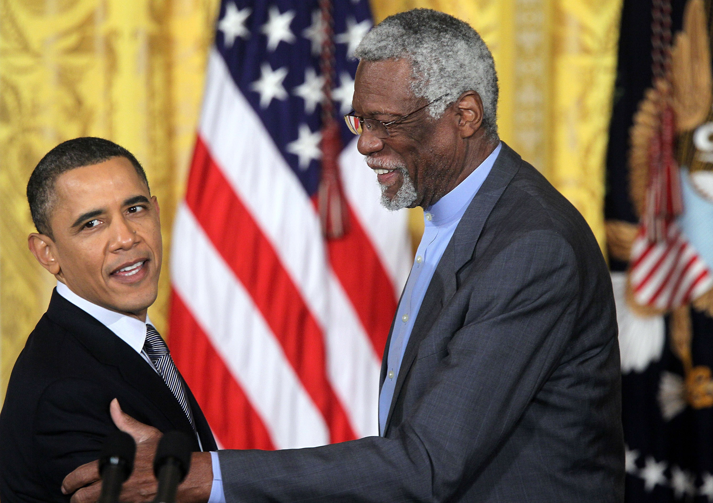 WASHINGTON, DC - FEBRUARY 15:  Former Boston Celtics captain Bill Russell (R) shares a moment with U.S. President Barack Obama during the 2010 Medal of Freedom presentation ceremony at the East Room of the White House February 15, 2011 in Washington, DC.