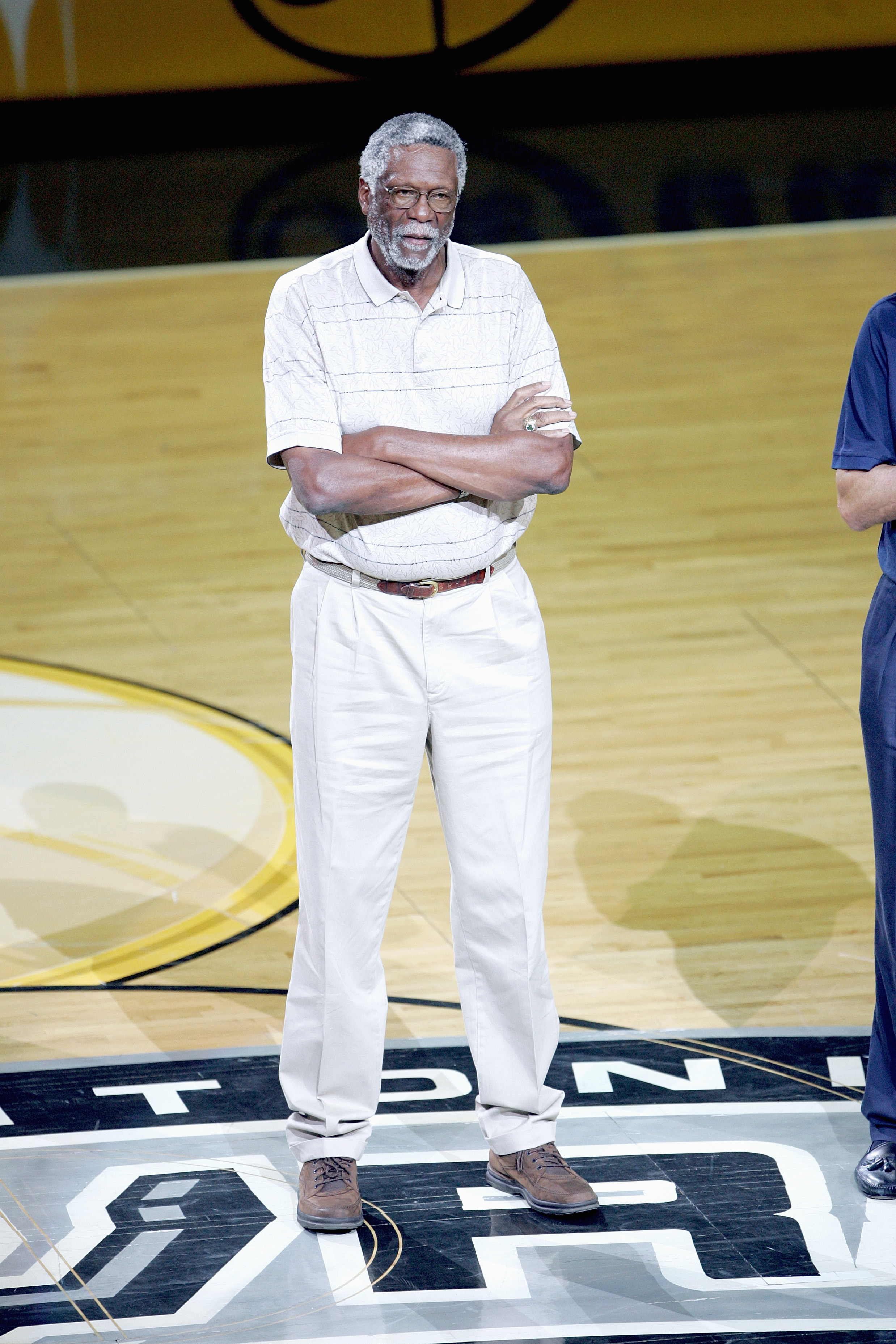 SAN ANTONIO - JUNE 12: NBA legend Bill Russell is introduced to the crowd before Game two of the 2005 NBA Finals between the Detroit Pistons and the San Antonio Spurs at SBC Center on June 12, 2005 in San Antonio, Texas.  NOTE TO USER: User expressly ackn