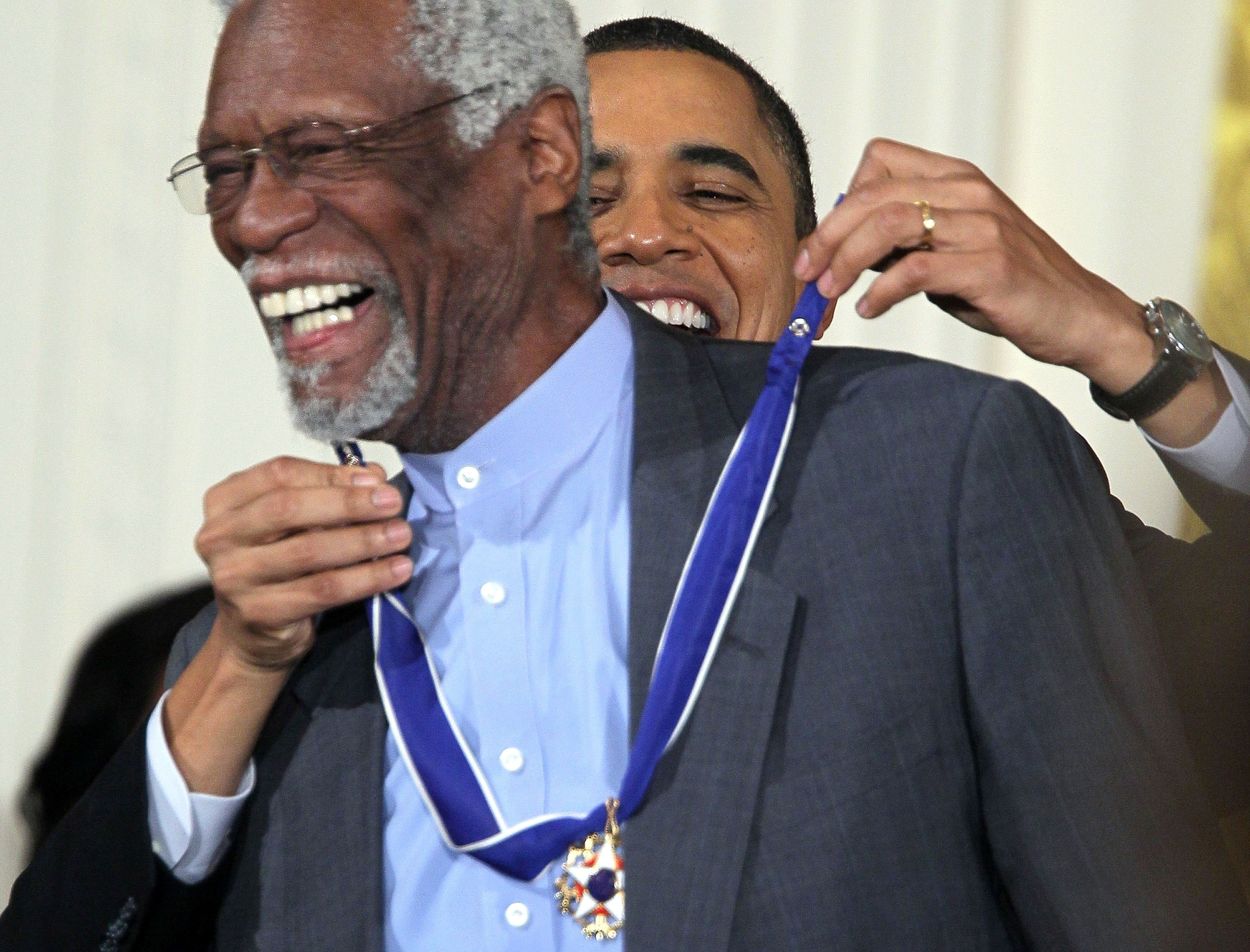 WASHINGTON, DC - FEBRUARY 15:  Former Boston Celtics captain Bill Russell (L) is presented with the 2010 Medal of Freedom by U.S. President Barack Obama during an East Room event at the White House February 15, 2011 in Washington, DC. Obama presented the