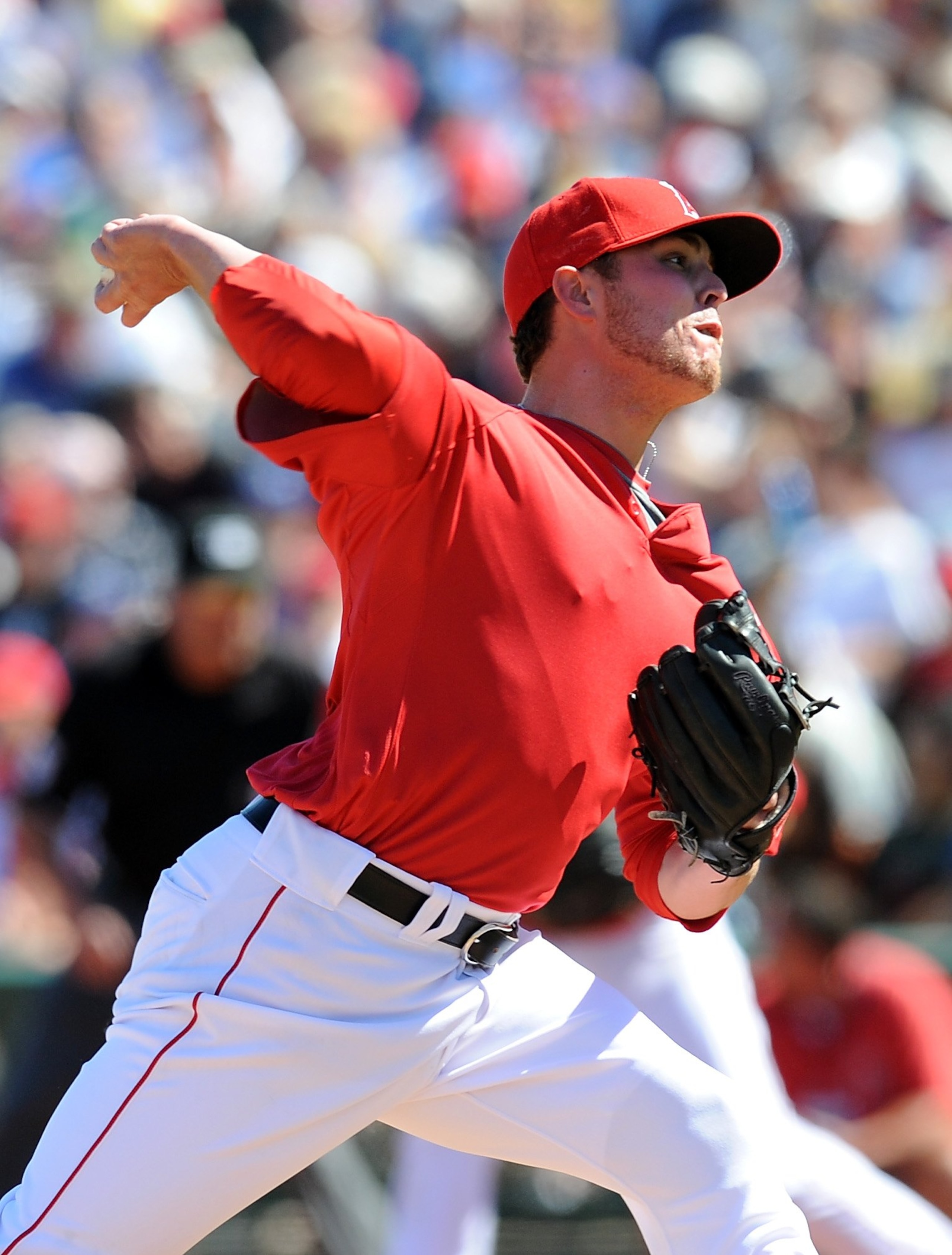 TEMPE, AZ - MARCH 15:  Michael Kohn #58 of the Los Angeles Angels of Anaheim pitches during a Spring Training game against the Los Angeles Dodgers on March 15, 2010 at Tempe Diablo Stadium in Tempe, Arizona.  (Photo by Lisa Blumenfeld/Getty Images)