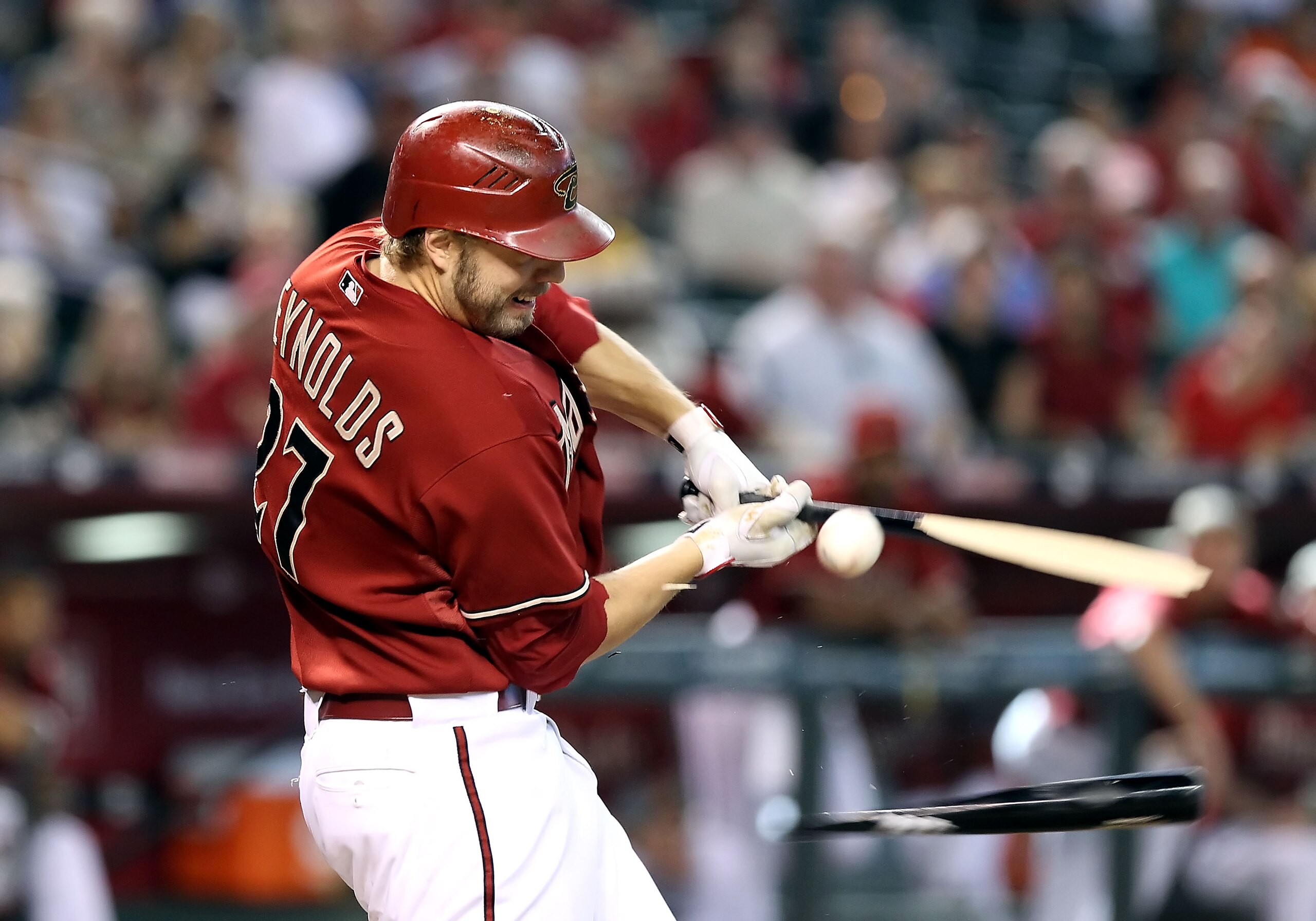 PHOENIX - SEPTEMBER 06:  Mark Reynolds #27 of the Arizona Diamondbacks breaks his bat as he swings during the Major League Baseball game against the San Francisco Giants at Chase Field on September 6, 2010 in Phoenix, Arizona. The Giants defeated the Diam