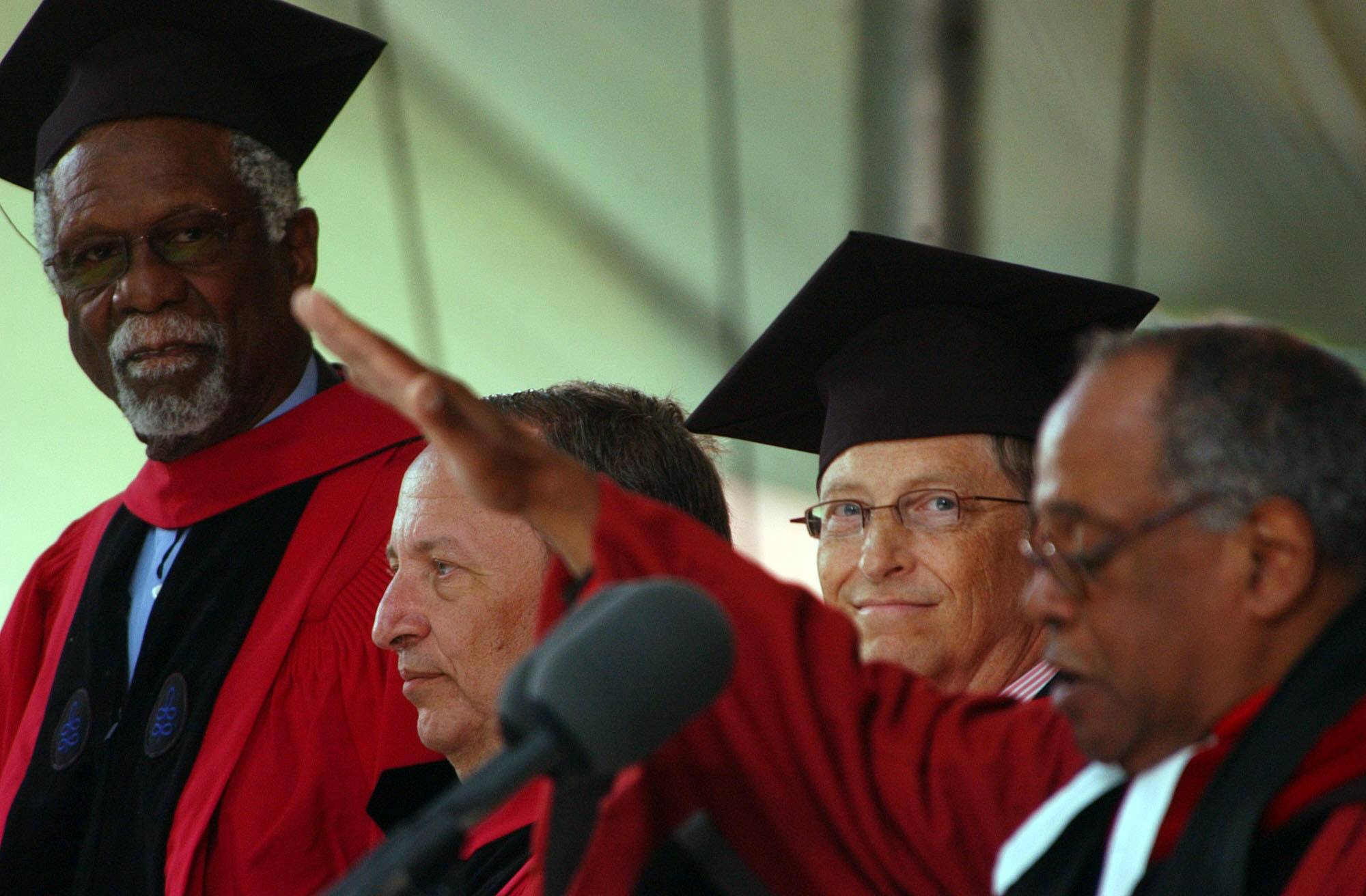 CAMBRIDGE, MA - JUNE 7:  Microsoft co-founder and Chairman Bill Gates (2nd R) listens as commencement ceremonies wrap up at Harvard University June 7, 2007 in Cambridge, Massachusetts. Gates, who enrolled at Harvard in a pre-law program in 1973 and left i