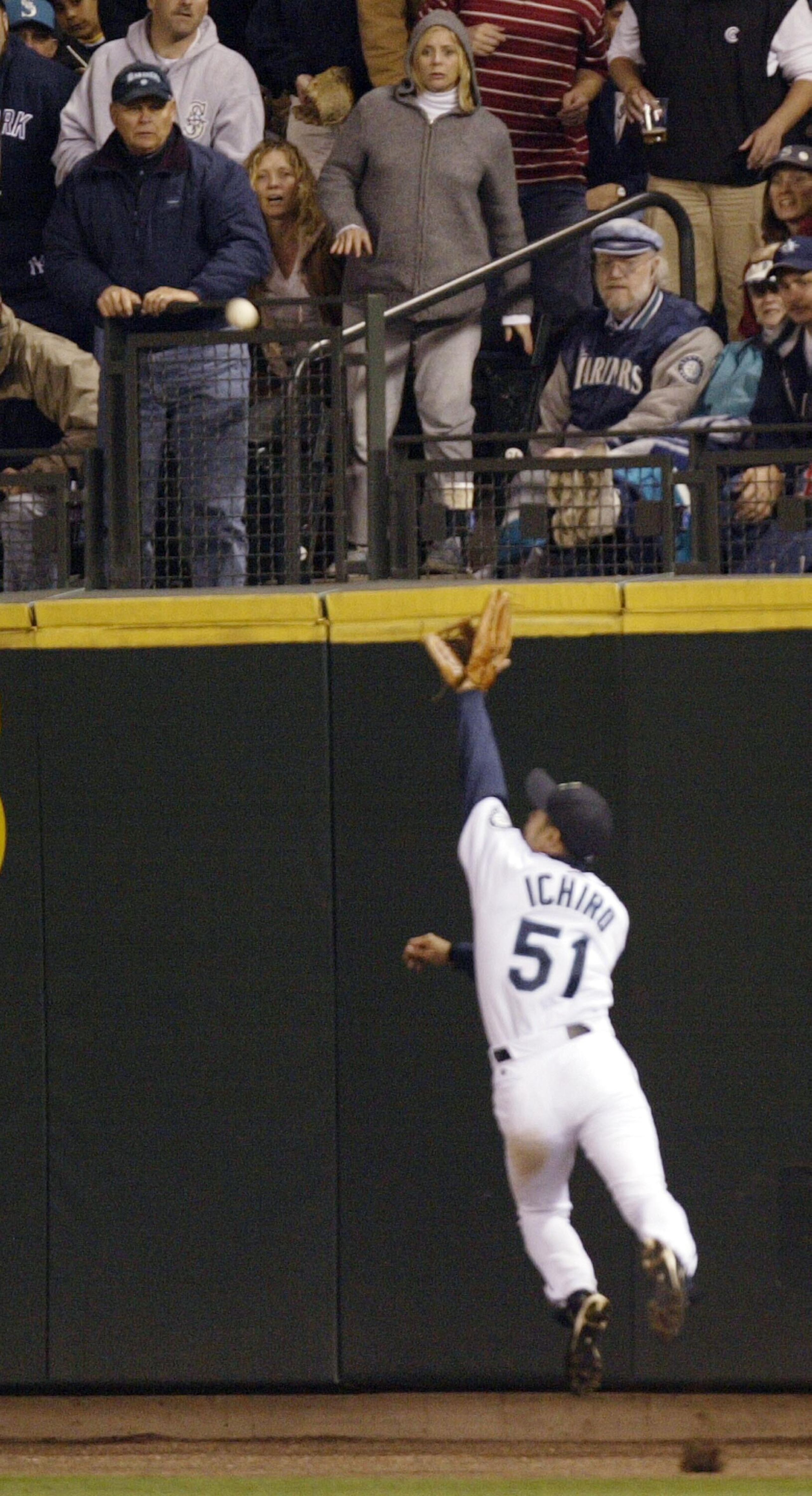 SEATTLE - MAY 8:  Ichiro Suzuki #51 of the Seattle Mariners attemps to make a leaping catch on a double off the wall by Gary Sheffield of the New York Yankees on May 8, 2004 at Safeco Field in Seattle, Washington. (Photo by Otto Greule Jr/Getty Images)