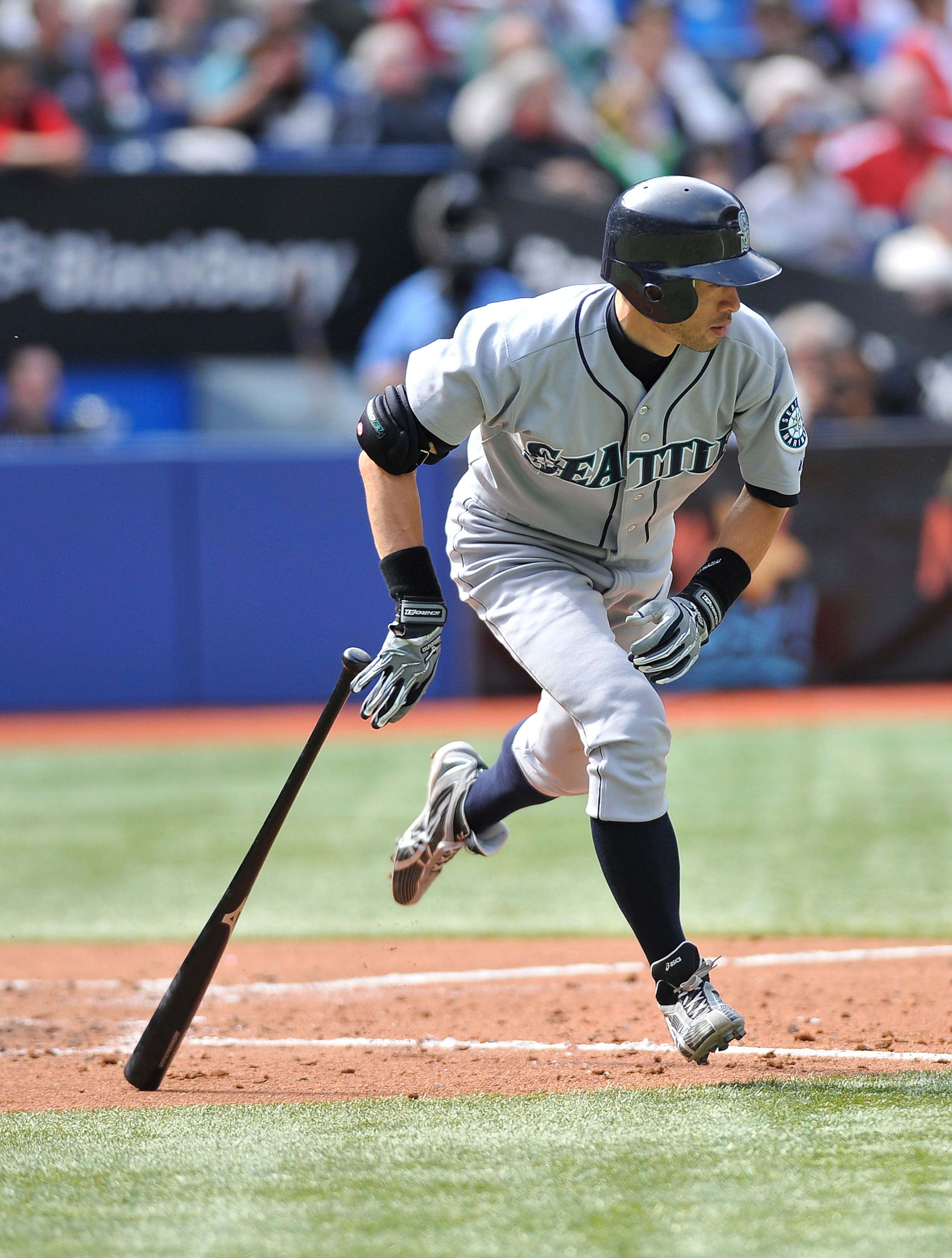 TORONTO - SEPTEMBER 23:   Ichiro Suzuki #51 of the Seattle Mariners runs to first base for his 200th hit of the season during game action against the Toronto Blue jays September 23, 2010 at Rogers Centre in Toronto, Ontario, Canada. (Photo by Brad White/G