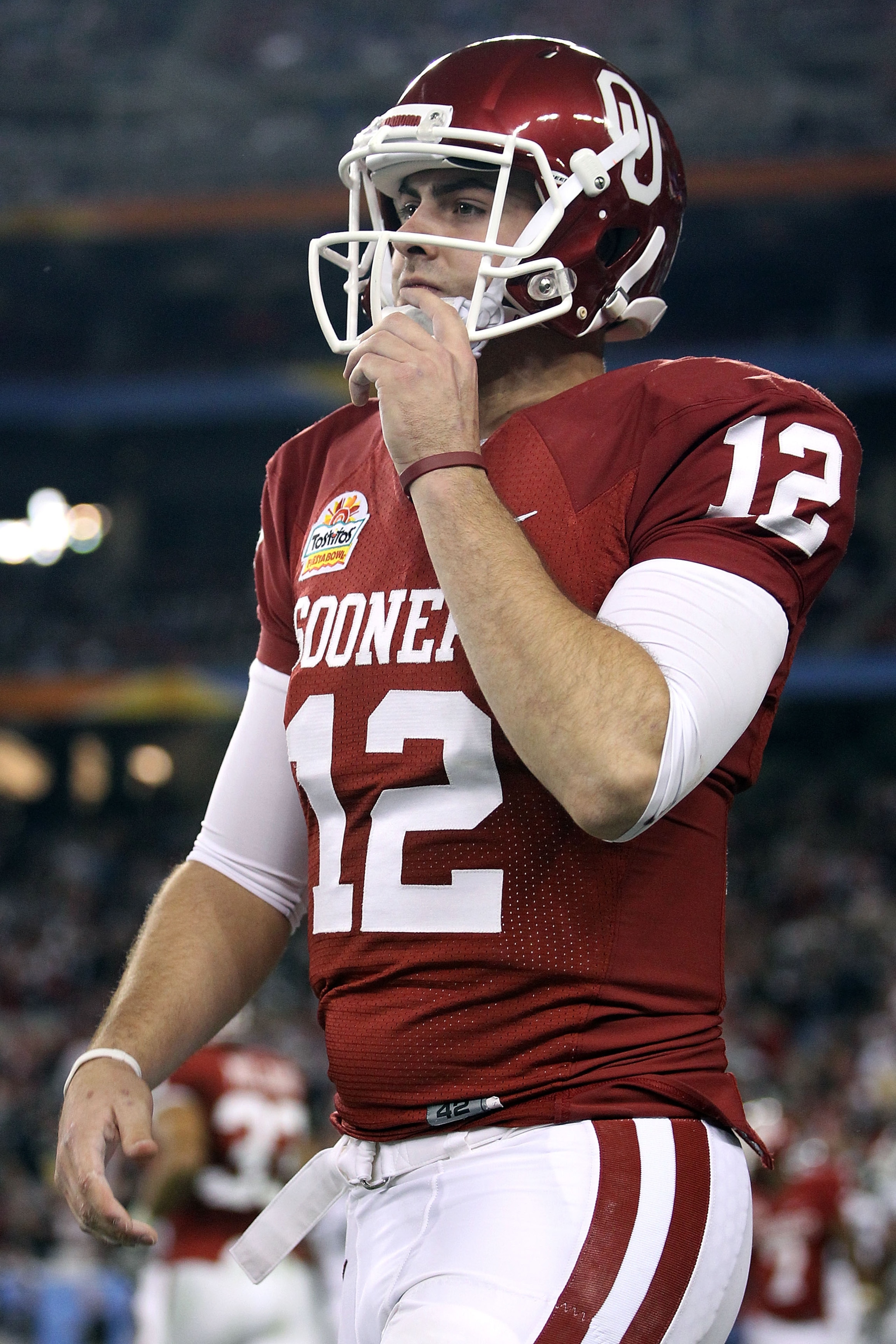 GLENDALE, AZ - JANUARY 01: Landry Jones #12 of the Oklahoma Sooners looks on against the Connecticut Huskies during the Tostitos Fiesta Bowl at the Universtity of Phoenix Stadium on January 1, 2011 in Glendale, Arizona. (Photo by Christian Petersen/Gett GLENDALE, AZ - JANUARY 01: Landry Jones #12 of the Oklahoma Sooners looks on against the Connecticut Huskies during the Tostitos Fiesta Bowl at the Universtity of Phoenix Stadium on January 1, 2011 in Glendale, Arizona. (Photo by Christian Petersen/Gett