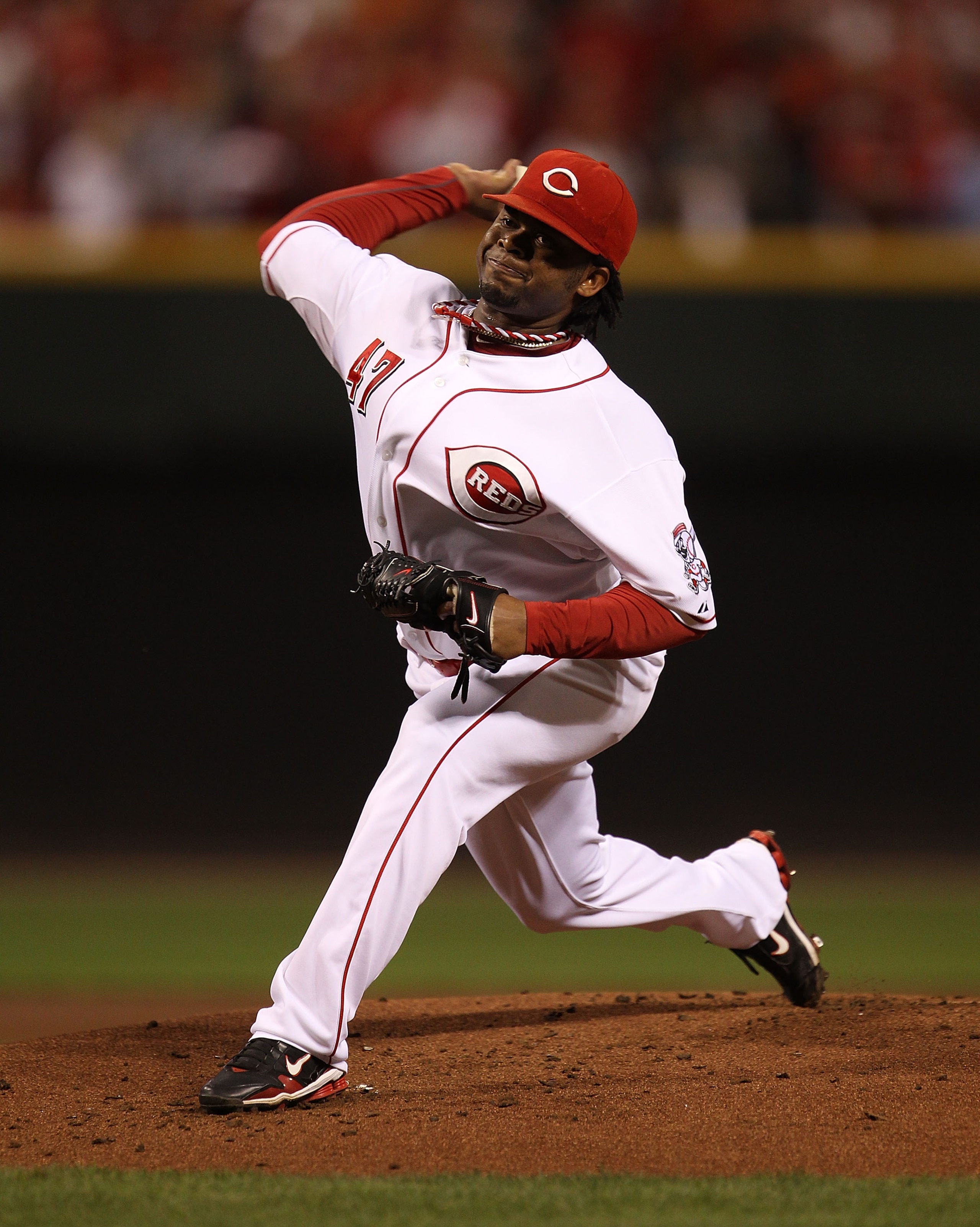 CINCINNATI - OCTOBER 10: Starting pitcher Johnny Cueto #47 of the Cincinnati Reds delivers the ball against the Philadelphia Phillies during game 3 of the NLDS at Great American Ball Park on October 10, 2010 in Cincinnati, Ohio. The Phillies defeated the CINCINNATI - OCTOBER 10: Starting pitcher Johnny Cueto #47 of the Cincinnati Reds delivers the ball against the Philadelphia Phillies during game 3 of the NLDS at Great American Ball Park on October 10, 2010 in Cincinnati, Ohio. The Phillies defeated the