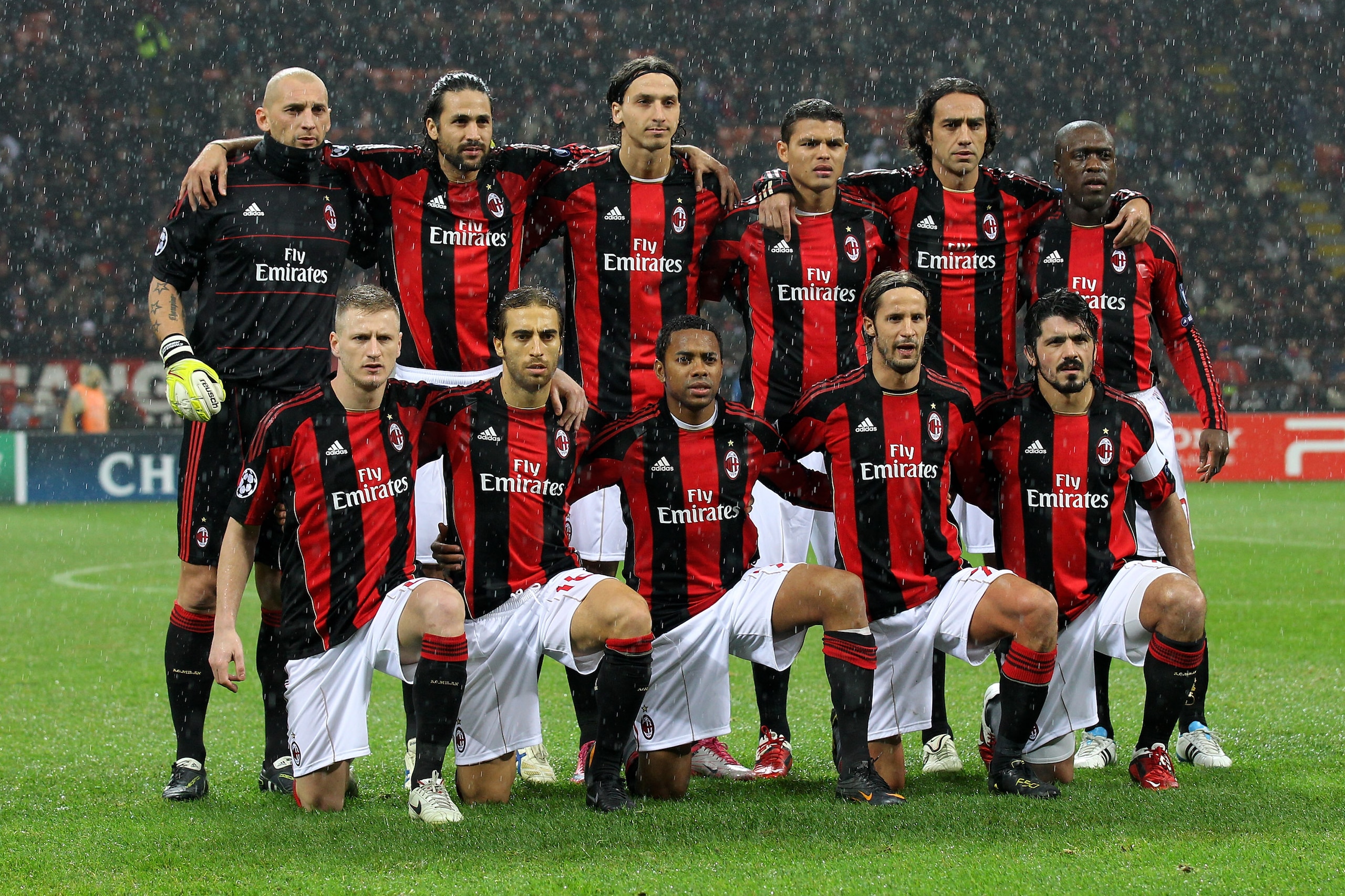 MILAN, ITALY - FEBRUARY 15:  The AC Milan players line up for a team phot prior to the UEFA Champions League round of 16 first leg match between AC Milan and Tottenham Hotspur at Stadio Giuseppe Meazza on February 15, 2011 in Milan, Italy. (Photo by Alex