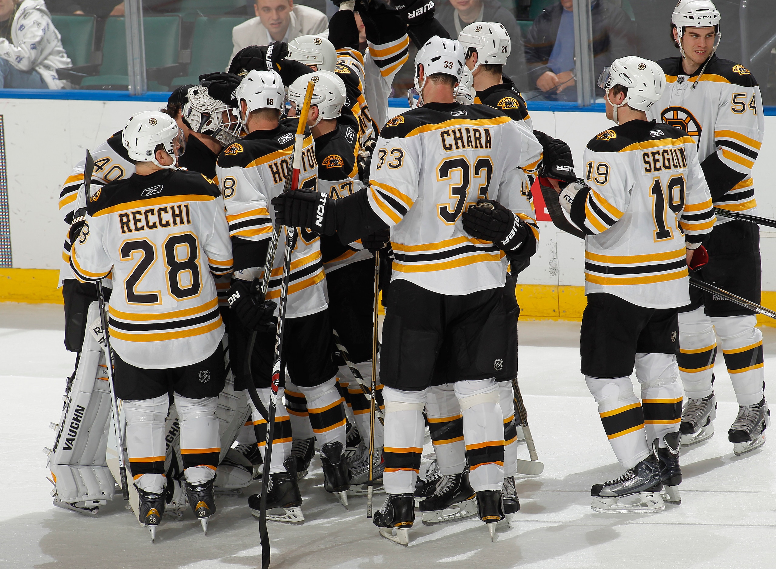 SUNRISE, FL - DECEMBER 27: Teammates congratulated goaltender Tim Thomas #30 of the Boston Bruins aftr he defeated the Florida Panthers in a shoot out on December 27, 2010 at the BankAtlantic Center in Sunrise, Florida. The Bruins defeated the Panthers 3-