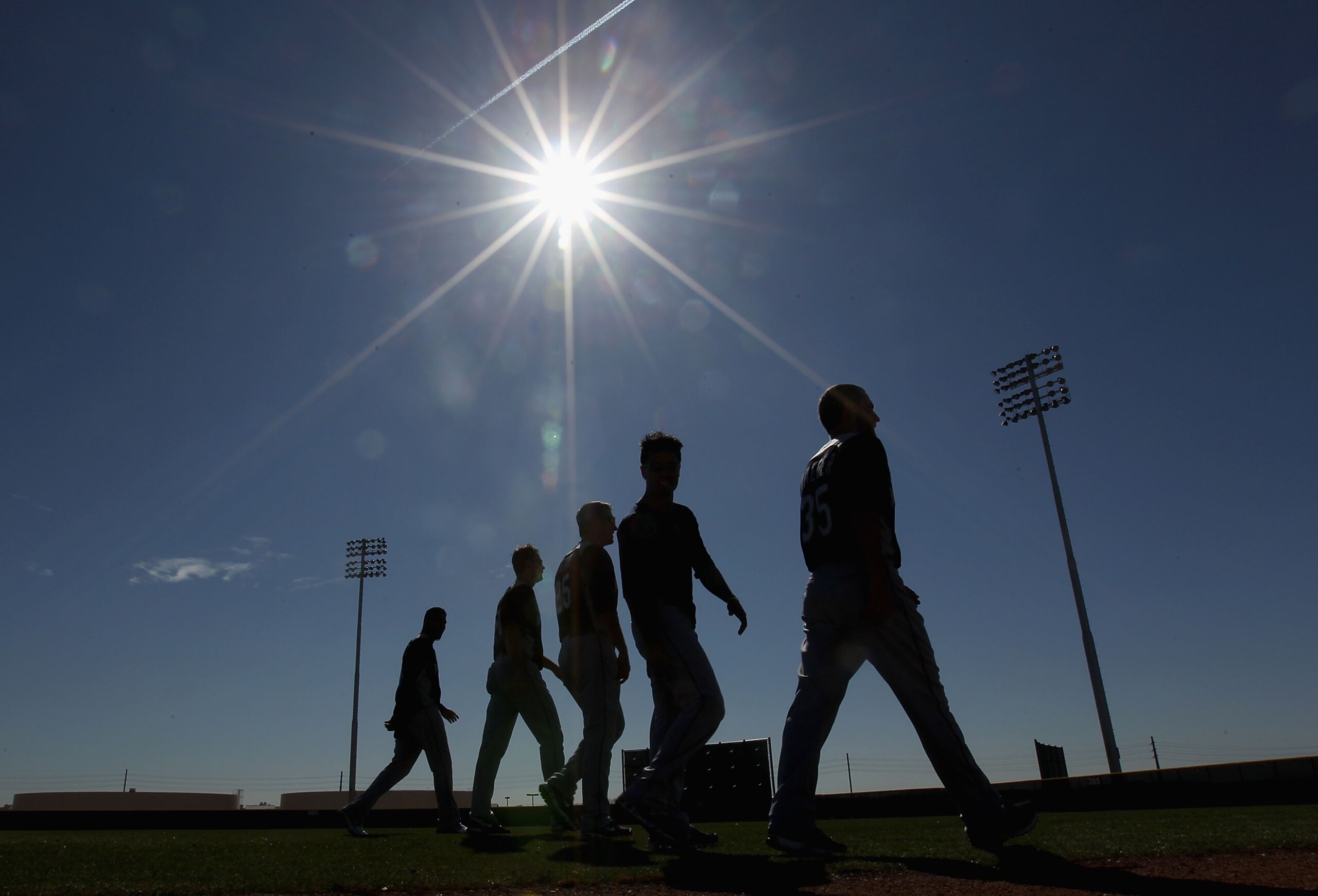 PEORIA, AZ - FEBRUARY 15:  Players from the Seattle Mariners take running drills during a MLB spring training practice at Peoria Stadium on February 15, 2011 in Peoria, Arizona.  (Photo by Christian Petersen/Getty Images)