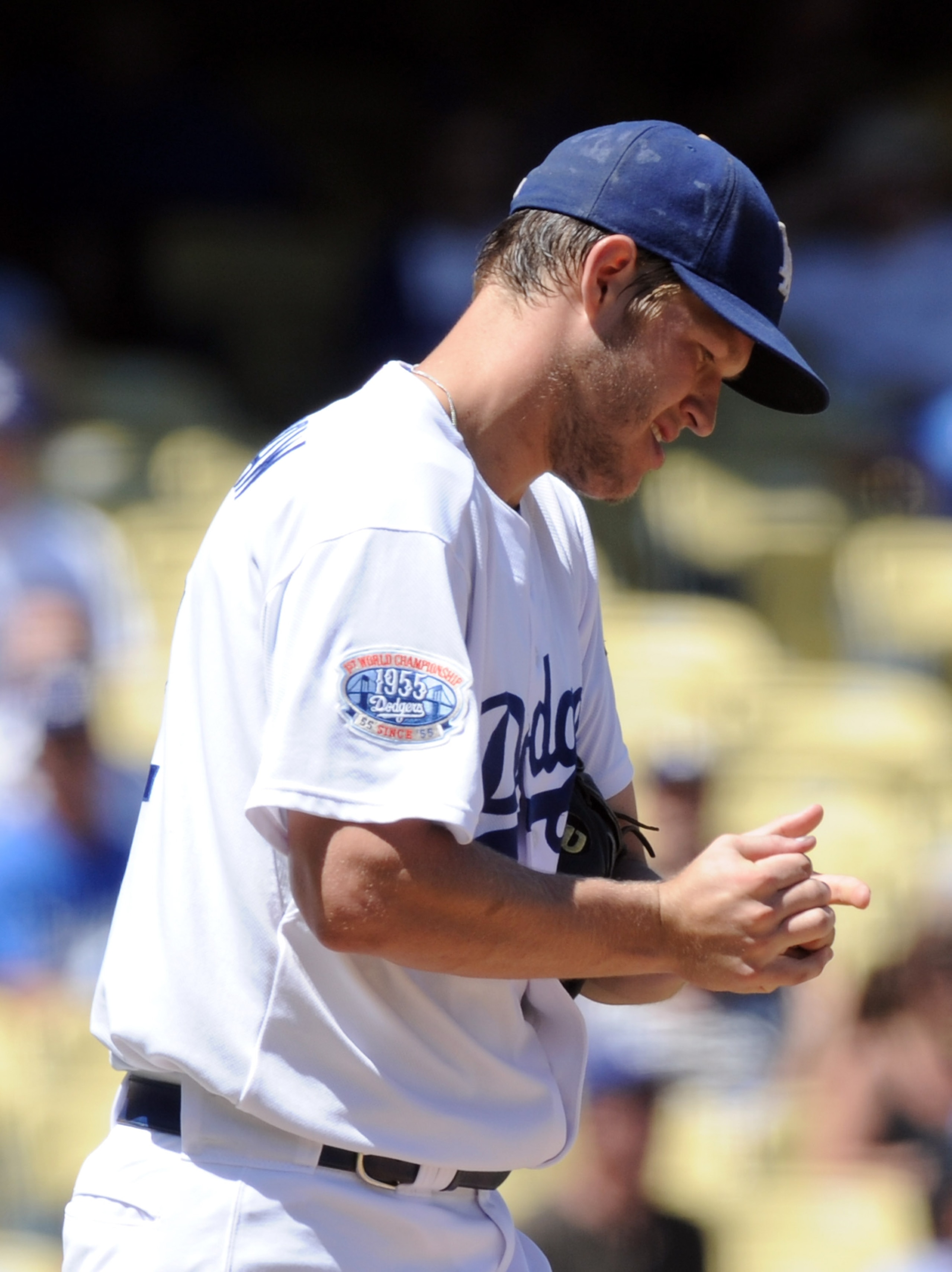 LOS ANGELES, CA - SEPTEMBER 01:  Clayton Kershaw #22 of the Los Angeles Dodgers reacts after a homerun by Shane Victorino #8 of the Philadelphia Phillies for a 2-0 lead during the second inning at Dodger Stadium on September 1, 2010 in Los Angeles, Califo