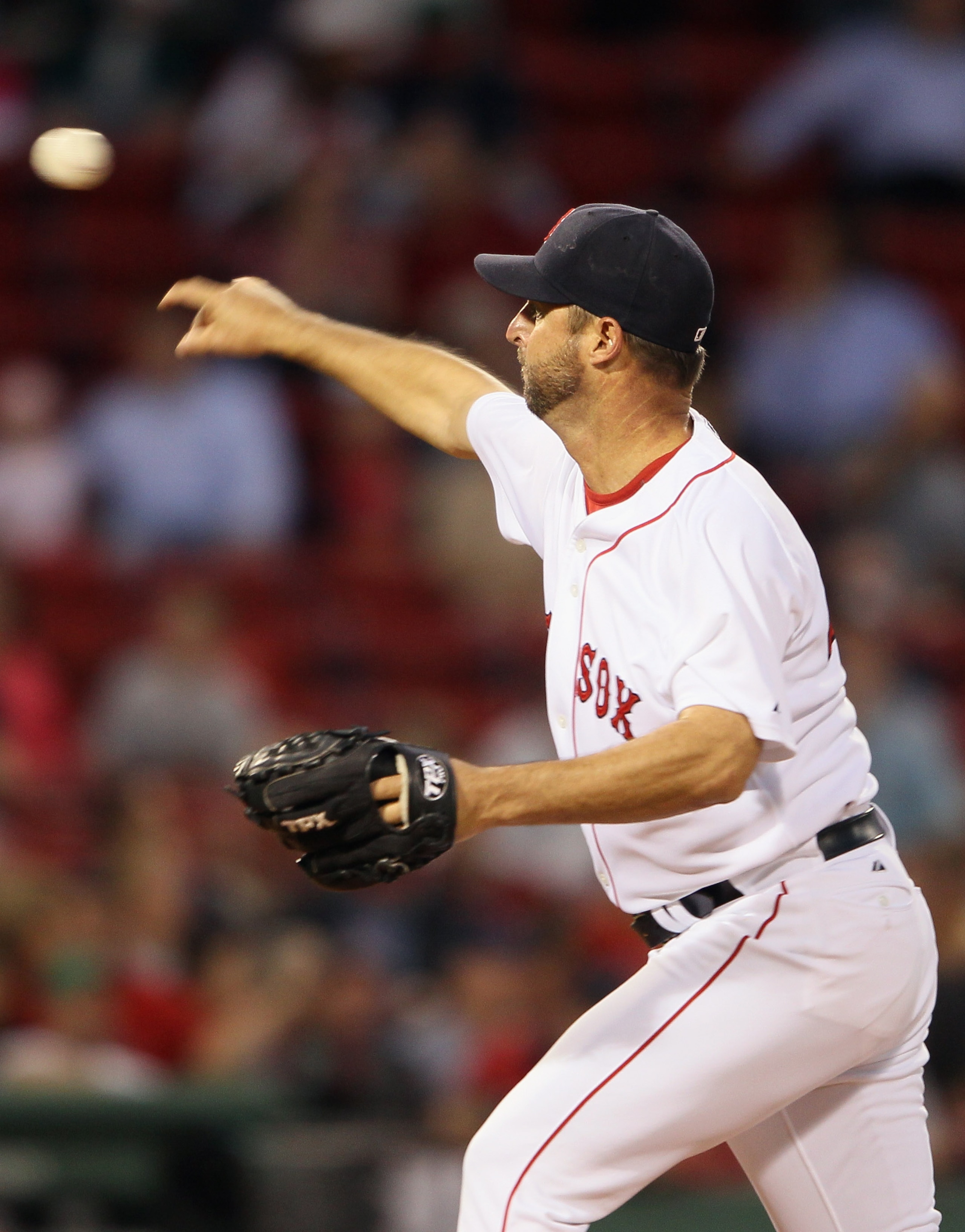 BOSTON - SEPTEMBER 08:  Tim Wakefield #49 of the Boston Red Sox delivers a pitch in the first inning against the Tampa Bay Rays on September 8, 2010 at Fenway Park in Boston, Massachusetts.  (Photo by Elsa/Getty Images)