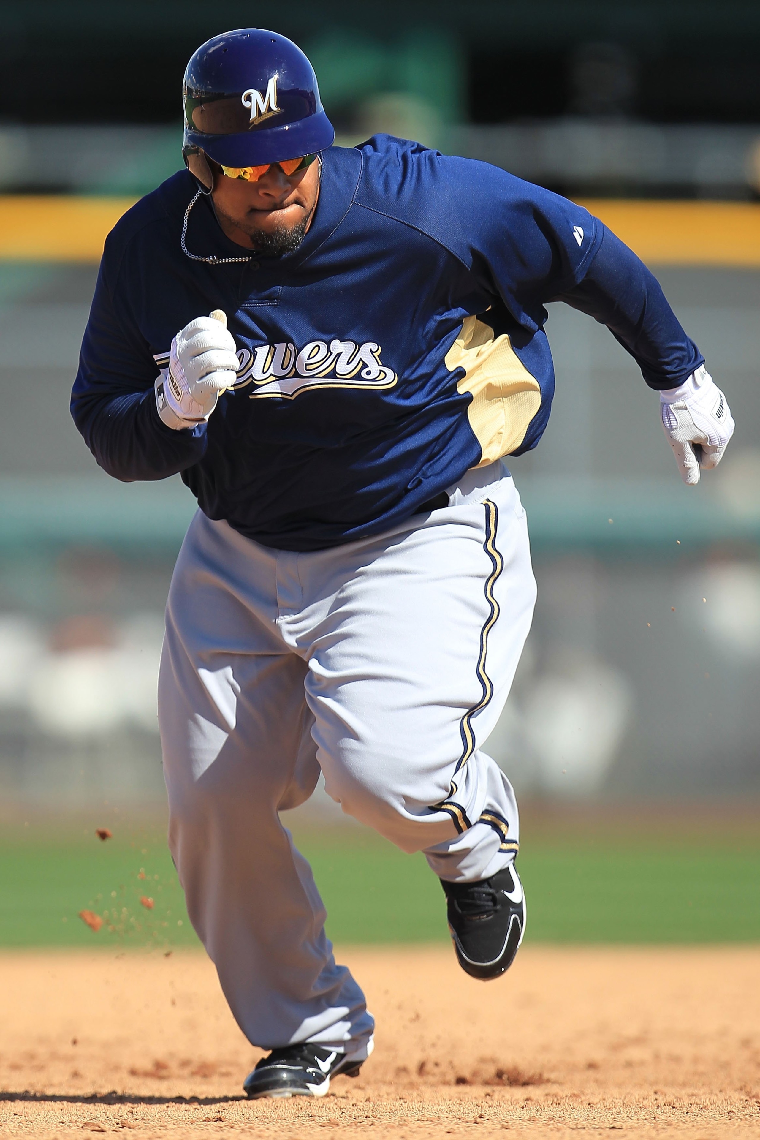 SCOTTSDALE, AZ - MARCH 04:  Prince Fielder #28 of the Milwaukee Brewers runs to third base against the San Francisco Giants during a spring training game at Scottsdale Stadium on March 4, 2010 in Scottsdale, Arizona.  (Photo by Chris McGrath/Getty Images)