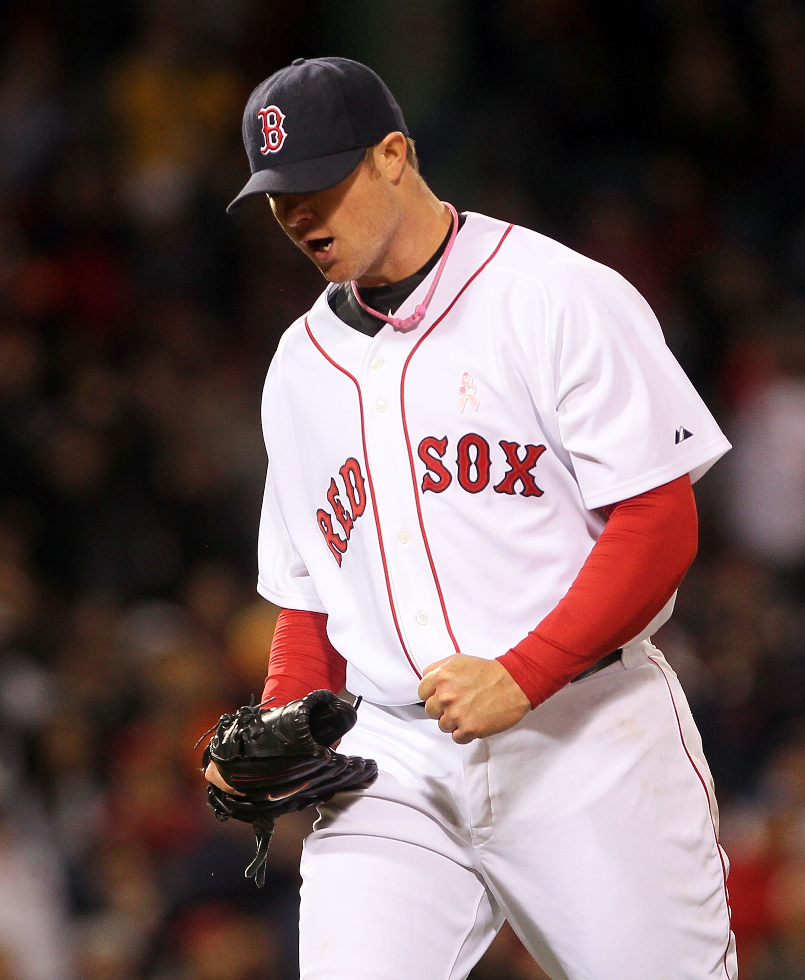 BOSTON - MAY 9:  Jon Lester #31 of the Boston Red Sox reacts in the sixth inning against the New York Yankees at Fenway Park on May 9, 2010 in Boston, Massachusetts. (Photo by Jim Rogash/Getty Images)