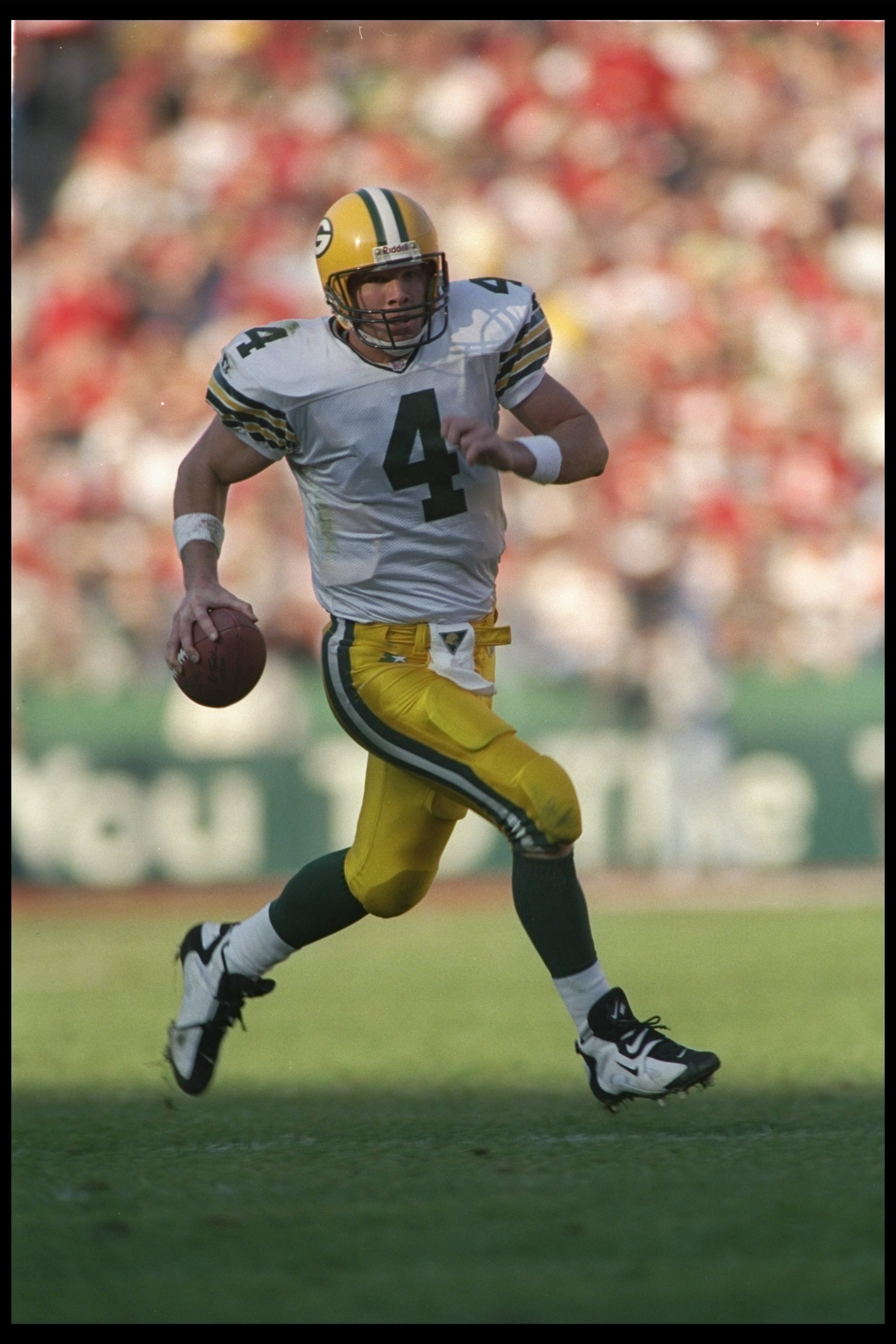 6 Jan 1996:  Quarterback Brett Favre of the Green Bay Packers runs down the field during a playoff game against the San Francisco 49ers at 3Com Park in San Francisco, California.  The Packers won the game 27-17. Mandatory Credit: Otto Greule Jr.  /Allspor