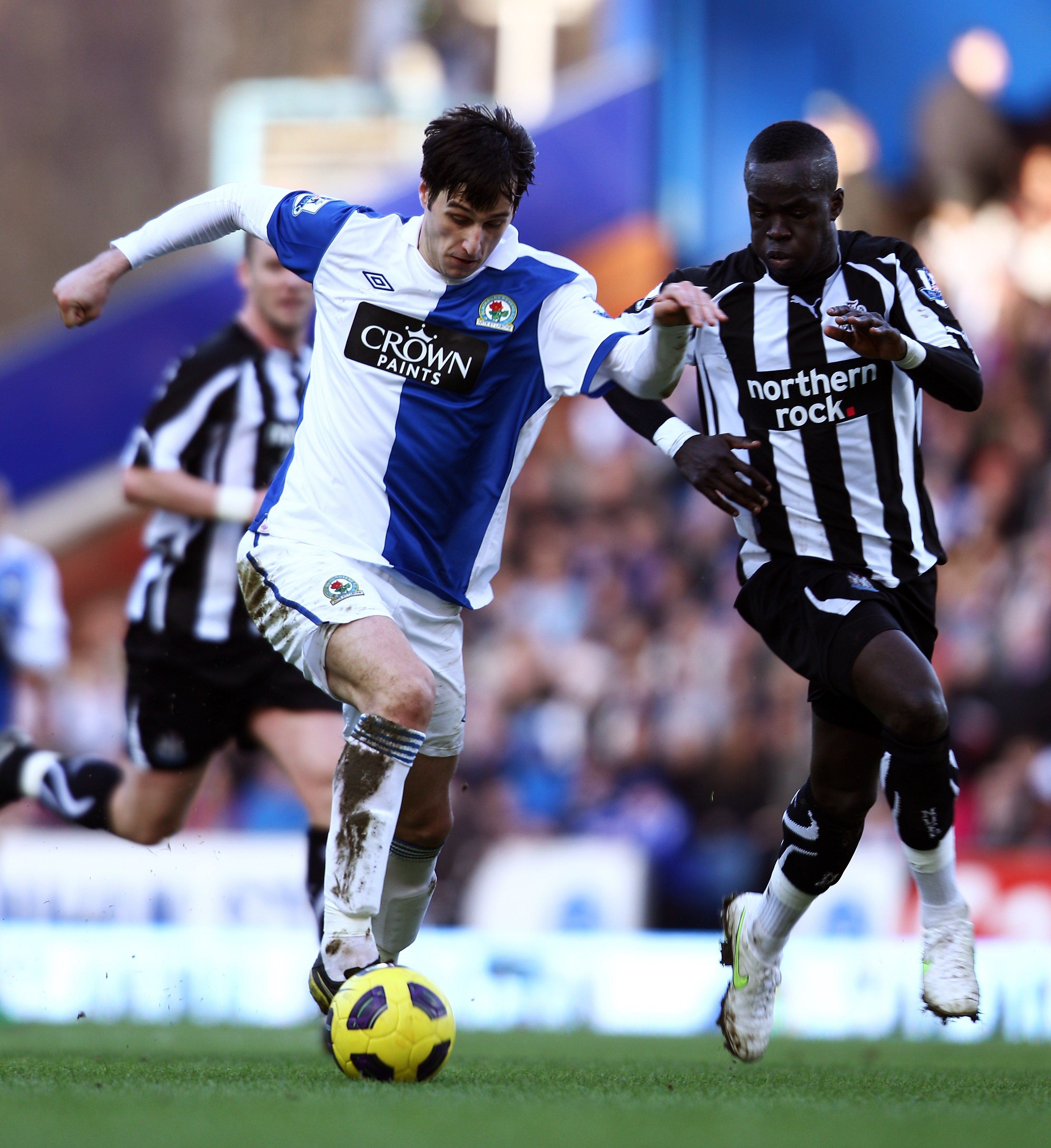 BLACKBURN, ENGLAND - FEBRUARY 12:  Nikola Kalinic of Blackburn and Cheik Tiote of Newcastle chase the ball during the Barclays Premier League match between Blackburn Rovers and Newcastle United at Ewood Park on February 12, 2011 in Blackburn, England.  (P