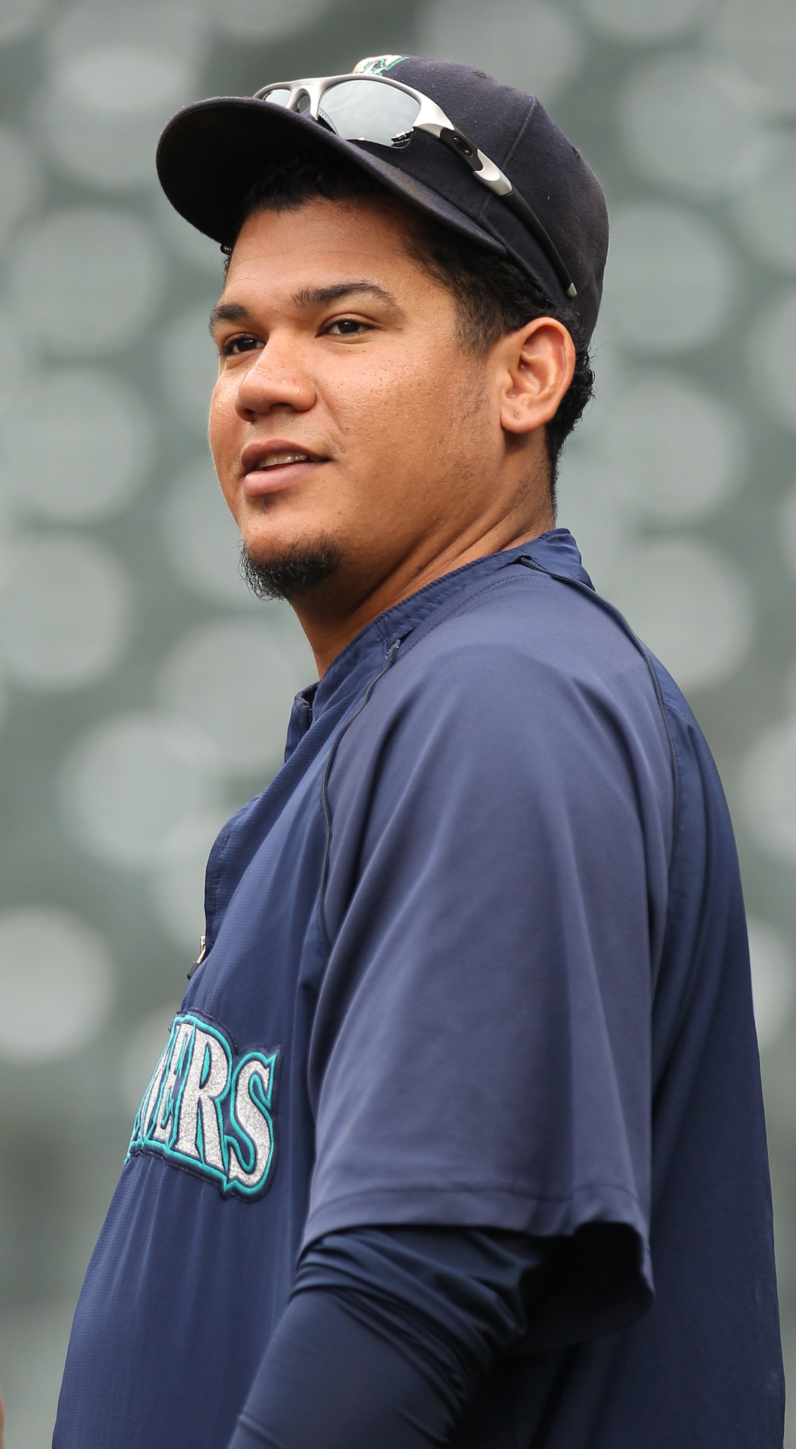 SEATTLE - SEPTEMBER 15:  Pitcher Felix Hernandez #34 of the Seattle Mariners looks on during batting practice prior to the game  against the Boston Red Sox at Safeco Field on September 15, 2010 in Seattle, Washington. (Photo by Otto Greule Jr/Getty Images