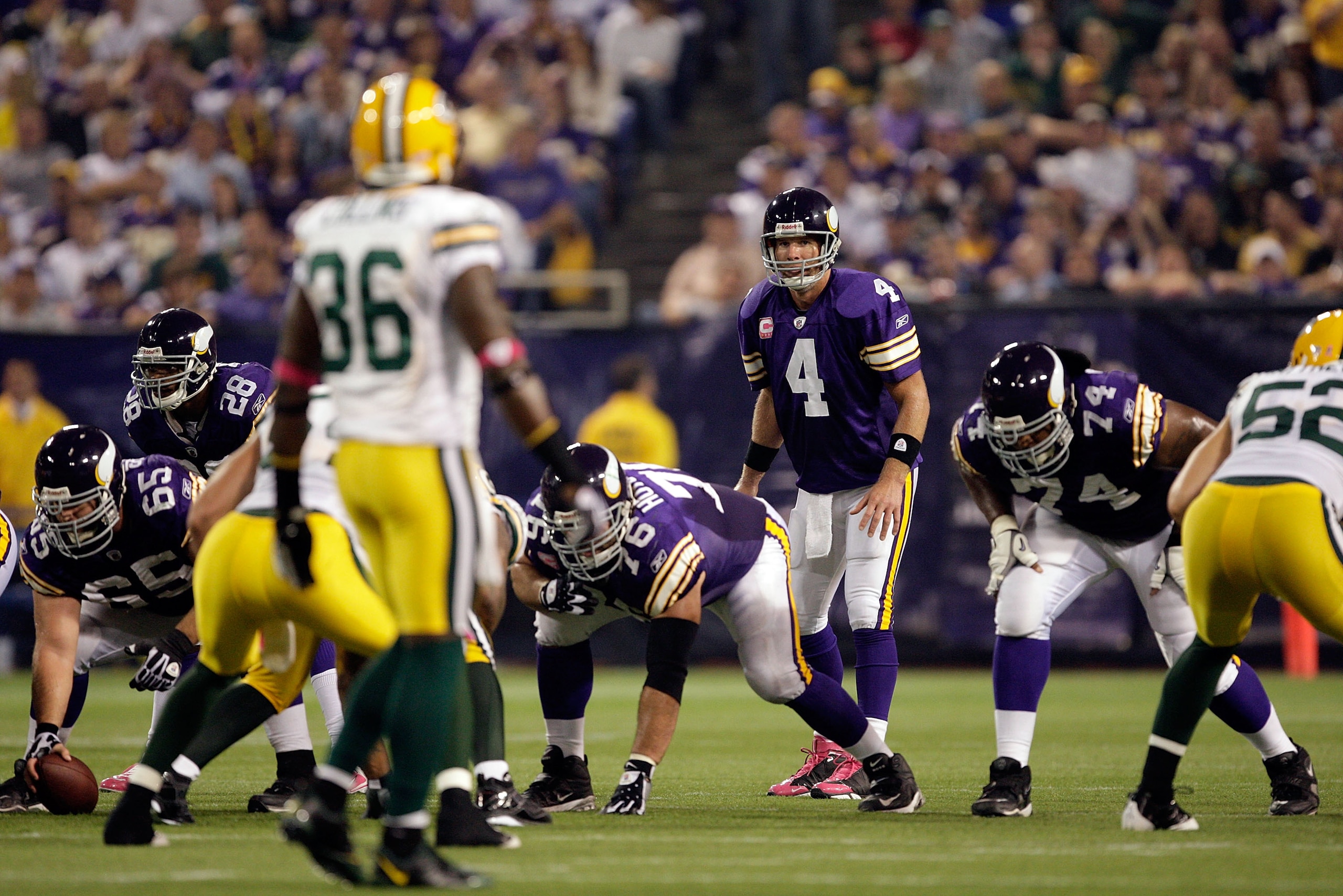 MINNEAPOLIS - OCTOBER 05:  Quarterback Brett Favre #4 of the Minnesota Vikings lines up during the Monday Night Football game against the Green Bay Packers on October 5, 2009 at Hubert H. Humphrey Metrodome in Minneapolis, Minnesota.  (Photo by Jamie Squi