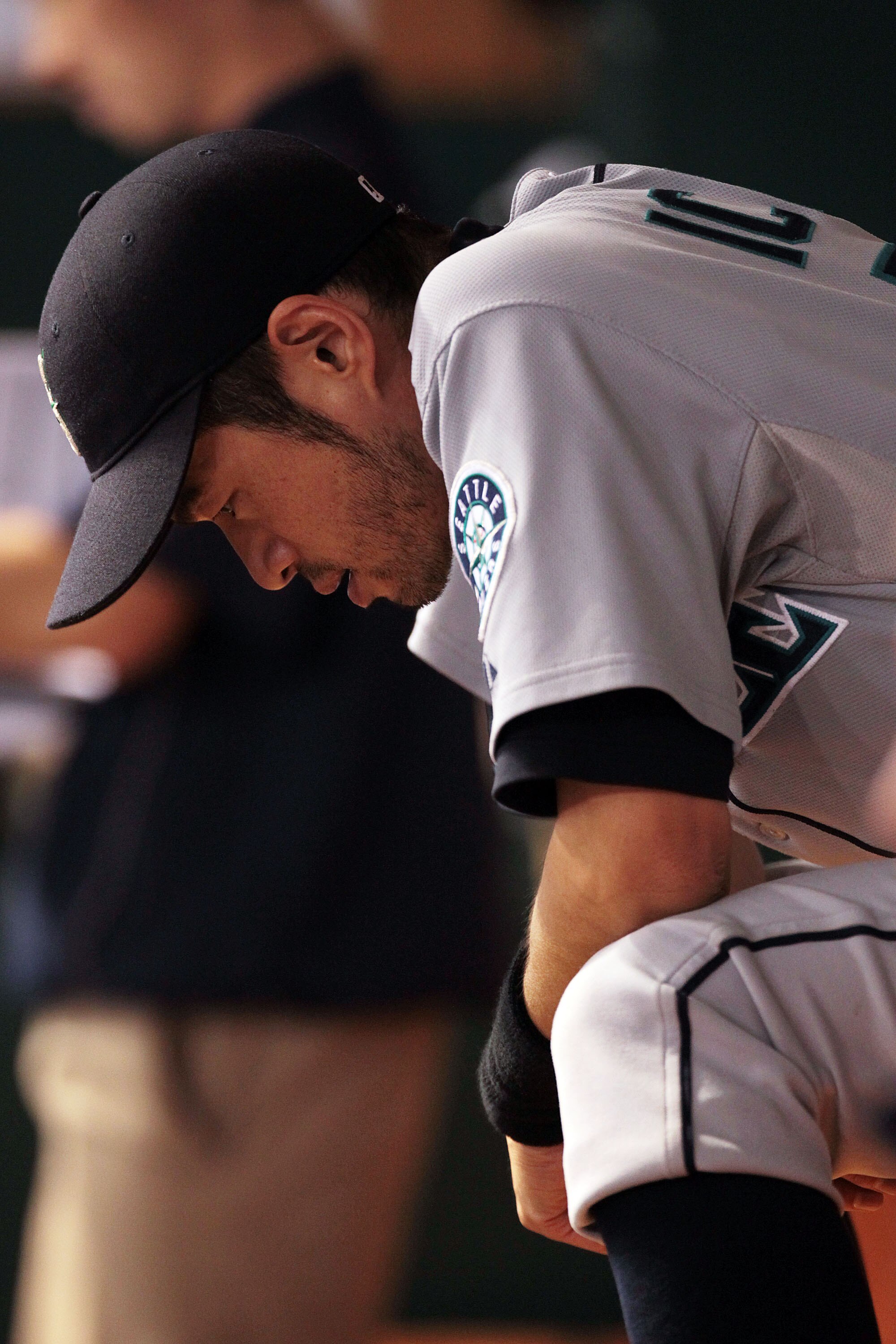 ST PETERSBURG, FL - SEPTEMBER 25: Ichiro Suzuki #51 of the Seattle Mariners sits in the dugout between at bats against the Tampa Bay Rays at Tropicana Field on September 25, 2010 in St. Petersburg, Florida. (Photo by Eliot J. Schechter/Getty Images)