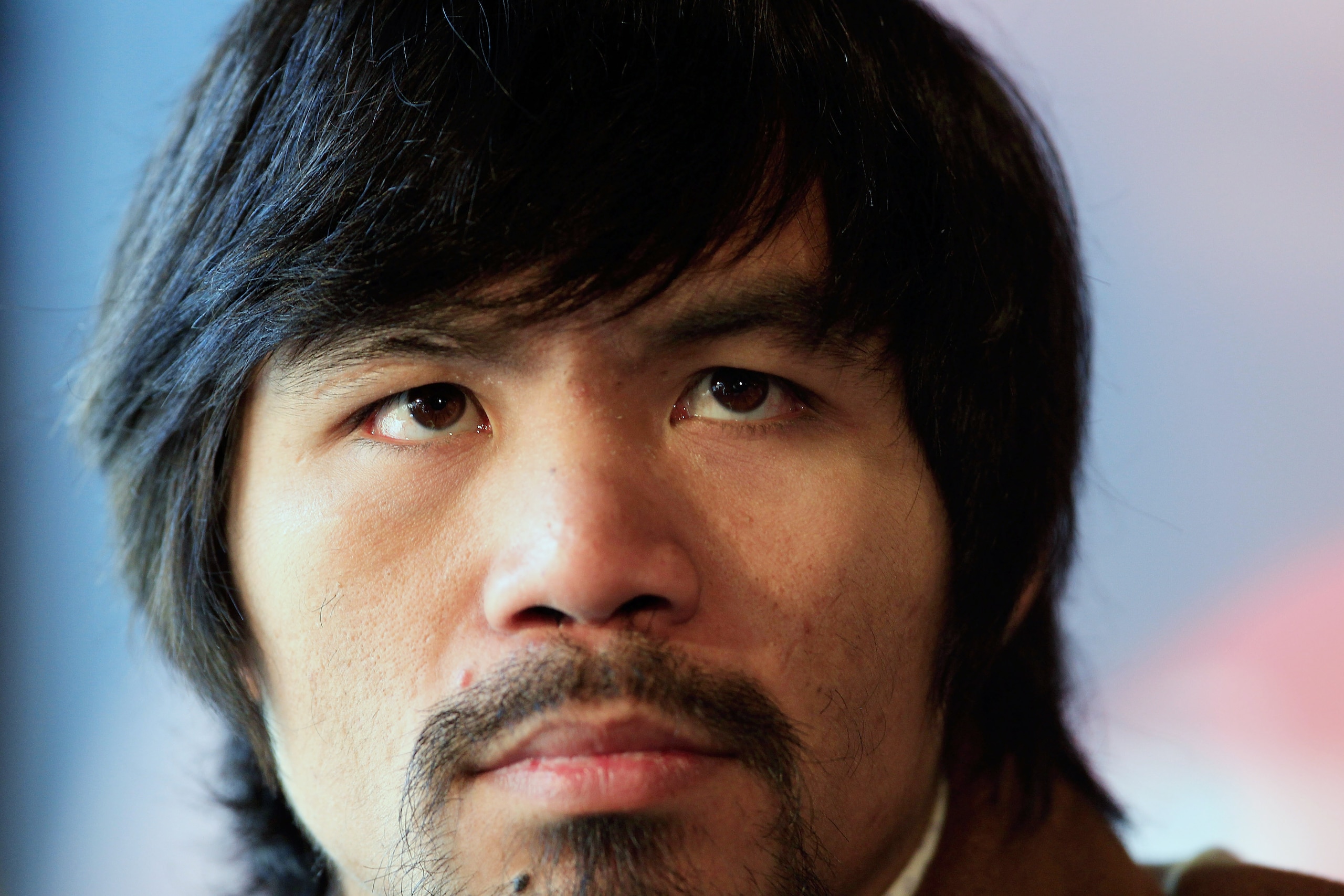 NEW YORK, NY - FEBRUARY 14:  Manny Pacquiao looks on at a press conference to promote his upcoming fight with Shane Mosley at The Lighthouse at Chelsea Piers on February 14, 2011 in New York City.  (Photo by Chris Trotman/Getty Images)