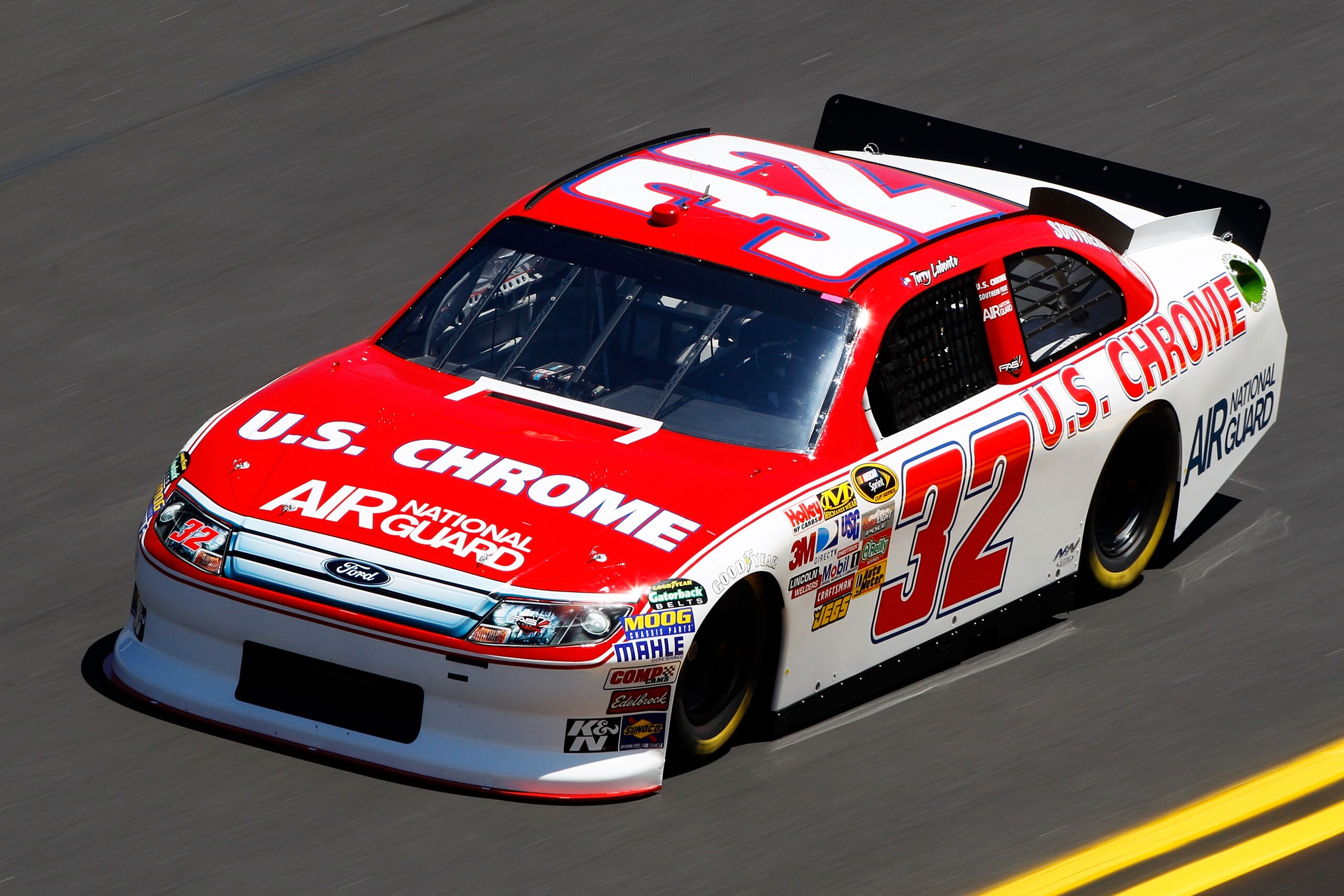 DAYTONA BEACH, FL - FEBRUARY 12:  Terry Labonte, driver of the #32 U.S. Chrome Ford, practices for the NASCAR Sprint Cup Series Daytona 500 at Daytona International Speedway on February 12, 2011 in Daytona Beach, Florida.  (Photo by Chris Graythen/Getty I