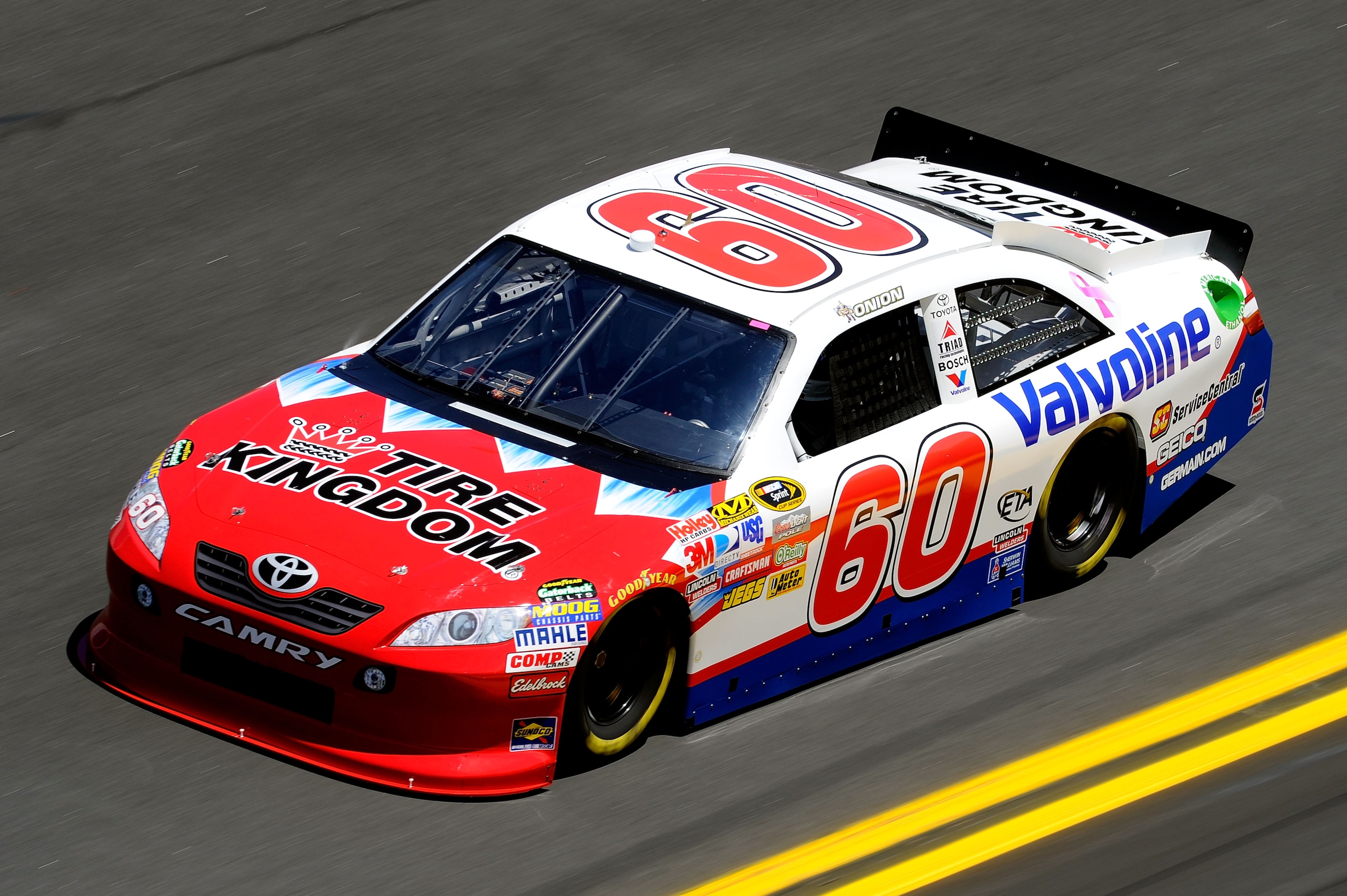 DAYTONA BEACH, FL - FEBRUARY 12:  Todd Bodine, driver of the #60 Tire Kingdom/Valvoline Toyota, practices for the NASCAR Sprint Cup Series Daytona 500 at Daytona International Speedway on February 12, 2011 in Daytona Beach, Florida.  (Photo by John Harrel