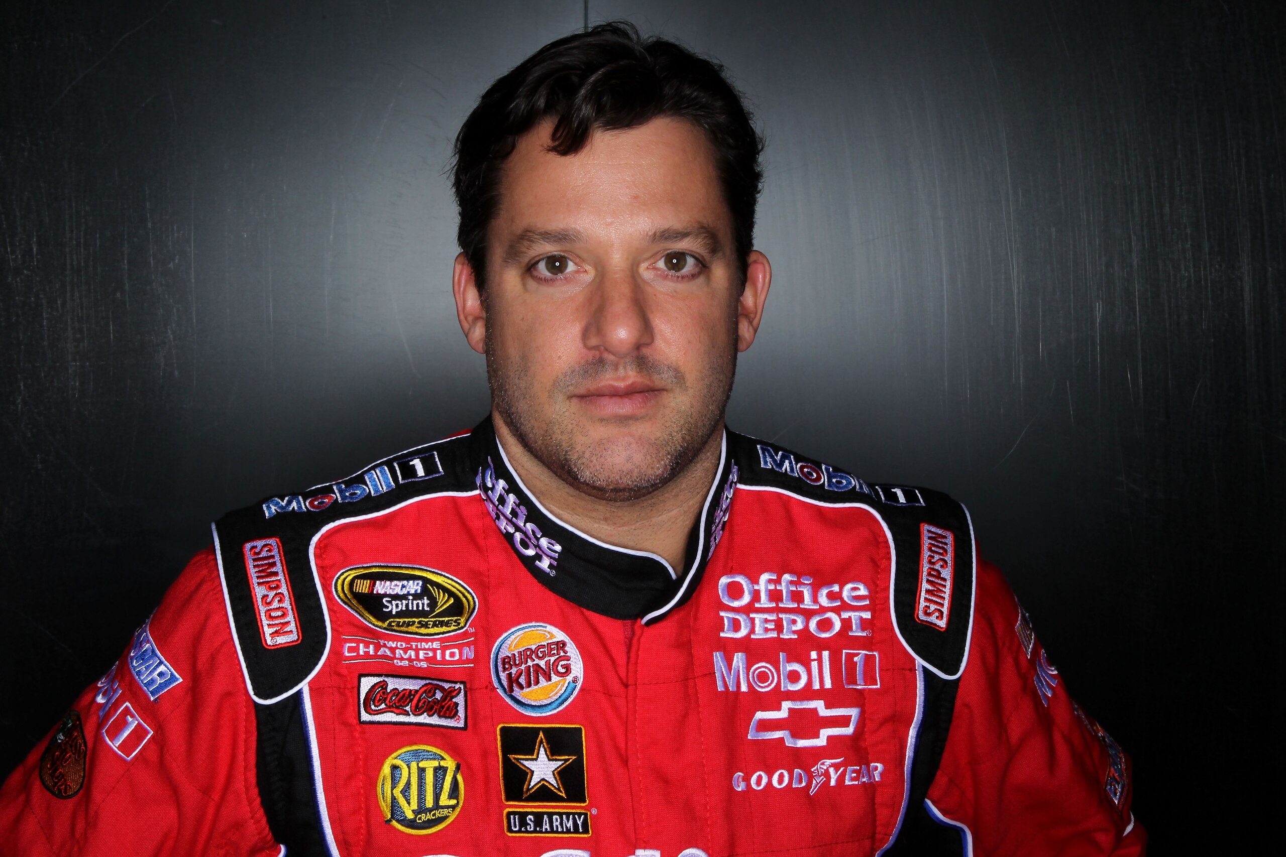 DAYTONA BEACH, FL - FEBRUARY 10:  Tony Stewart, driver of the #14 Office Depot Chevrolet, poses during the 2011 NASCAR Sprint Cup Series Media Day at Daytona International Speedway on February 10, 2011 in Daytona Beach, Florida.  (Photo by Nick Laham/Gett