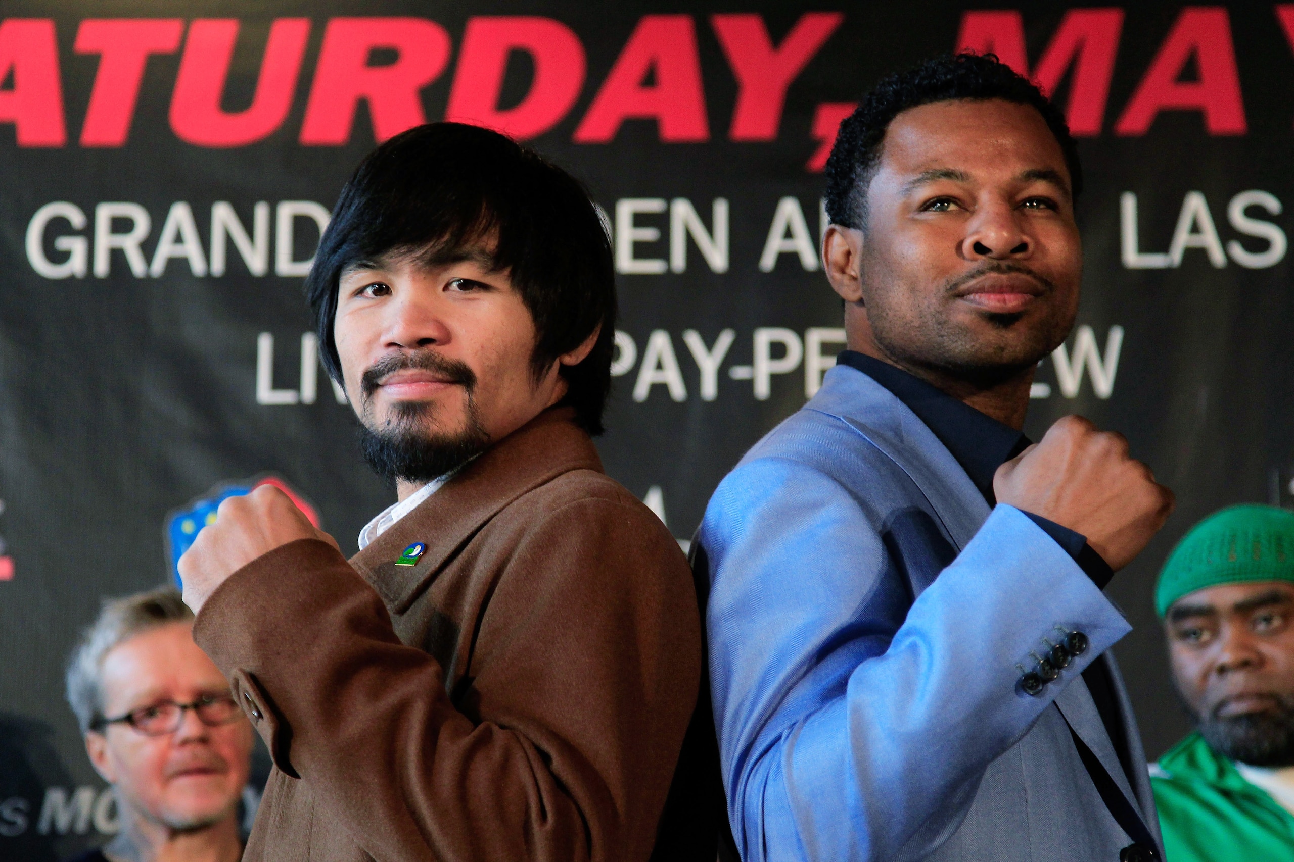 NEW YORK, NY - FEBRUARY 14:  (L) Manny Pacquiao and (R) Shane Mosley pose to promote their upcoming fight at The Lighthouse at Chelsea Piers on February 14, 2011 in New York City.  (Photo by Chris Trotman/Getty Images)