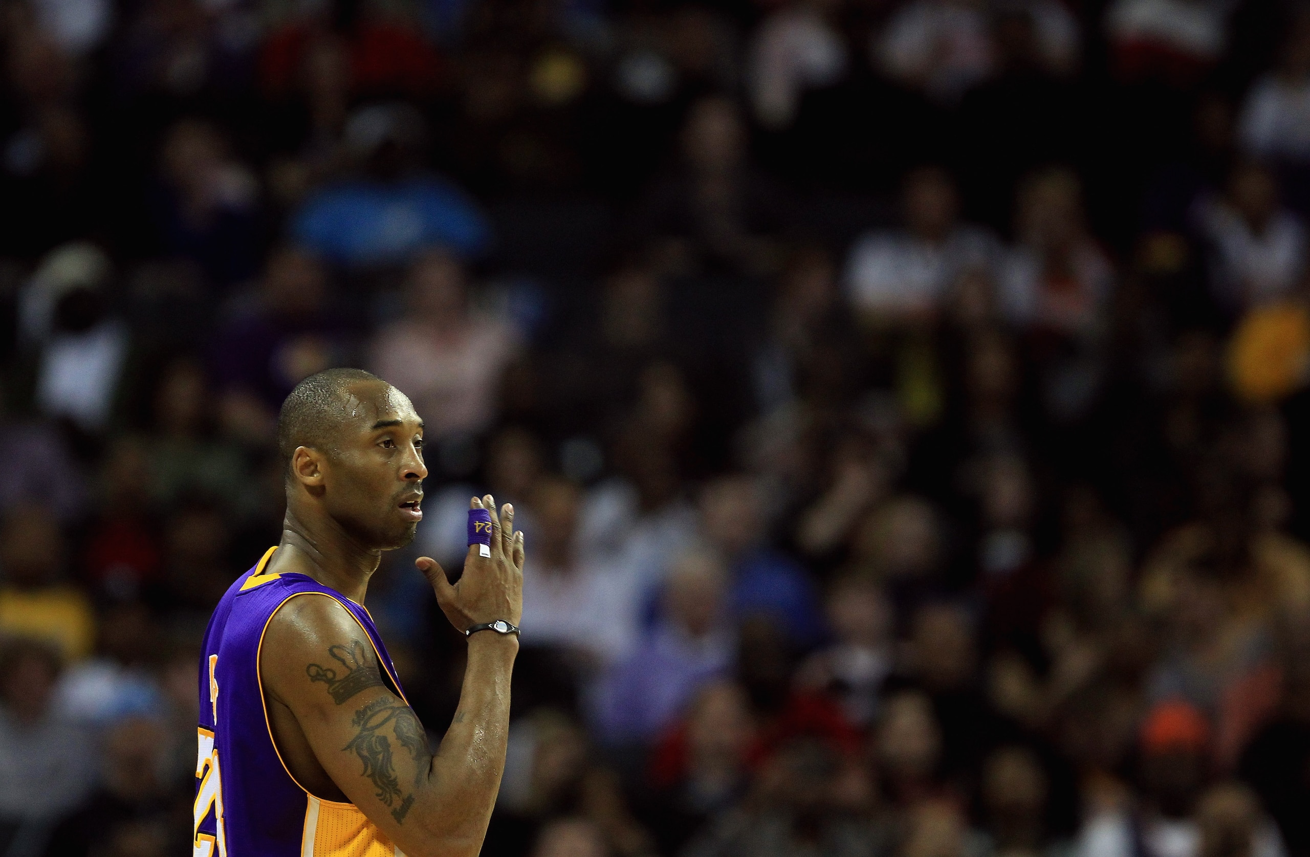 CHARLOTTE, NC - FEBRUARY 14:  Kobe Bryant #24 of the Los Angeles Lakers reacts to his bench against the Charlotte Bobcats during their game at Time Warner Cable Arena on February 14, 2011 in Charlotte, North Carolina. NOTE TO USER: User expressly acknowle