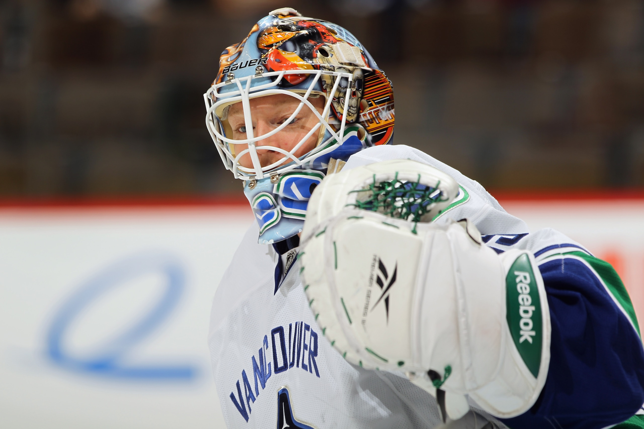 DENVER, CO - JANUARY 18:  Goalie Cory Schneider #35 of the Canucks looks on during warm up prior to facing the Colorado Avalanche at the Pepsi Center on January 18, 2011 in Denver, Colorado. The Avalanche defeated the Canucks 4-3 in overtime.  (Photo by D