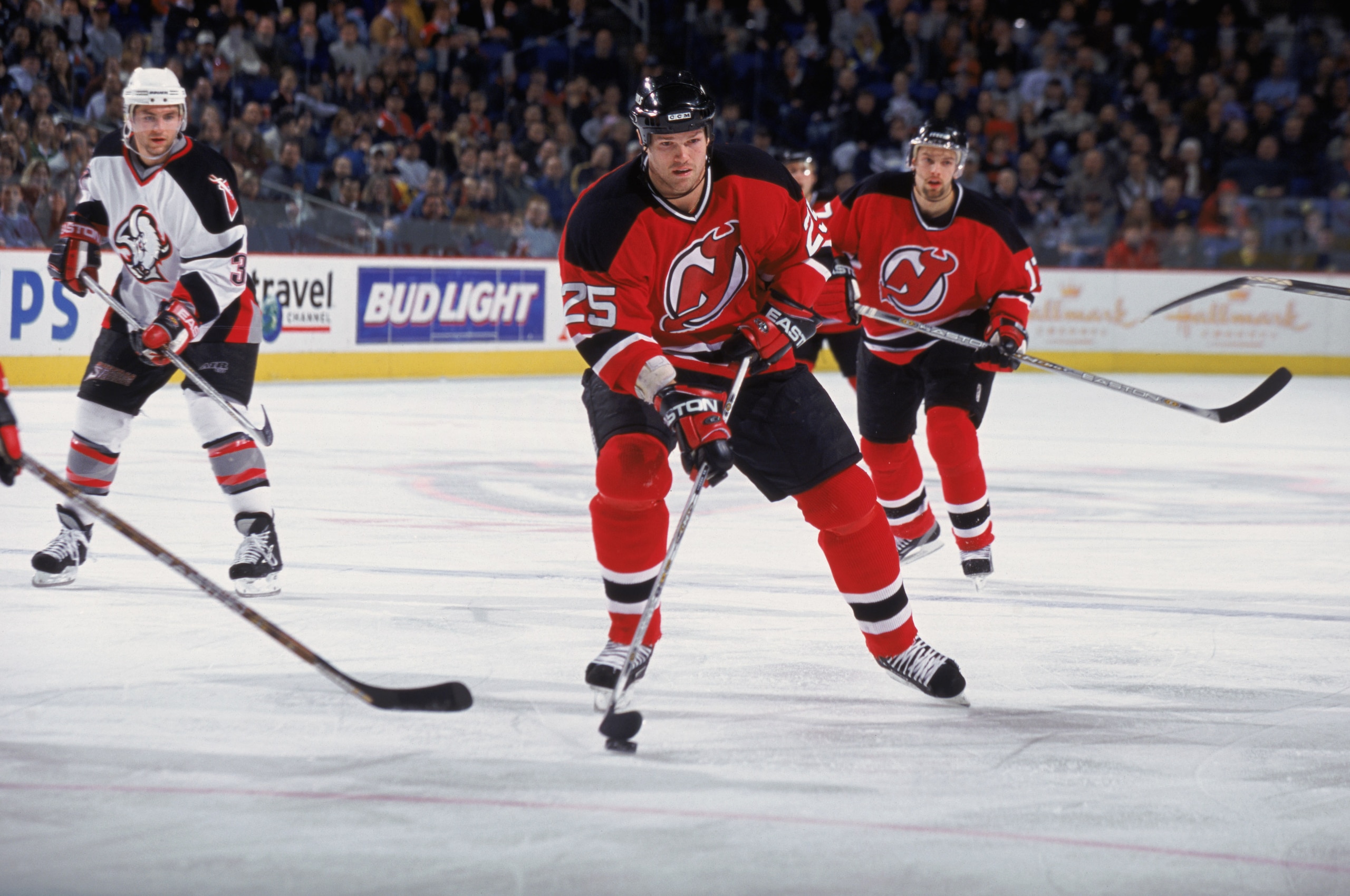 12 Feb 2002:  Jason Arnot #25 of the New Jersey Devils and teammate, right wing Petr Sykora #17, skate on the ice during the NHL game against the Buffalo Sabres at the HSBC Arena in Buffalo, New York. The Devils tied the Sabres, 2-2.   \ Mandatory Copyrig