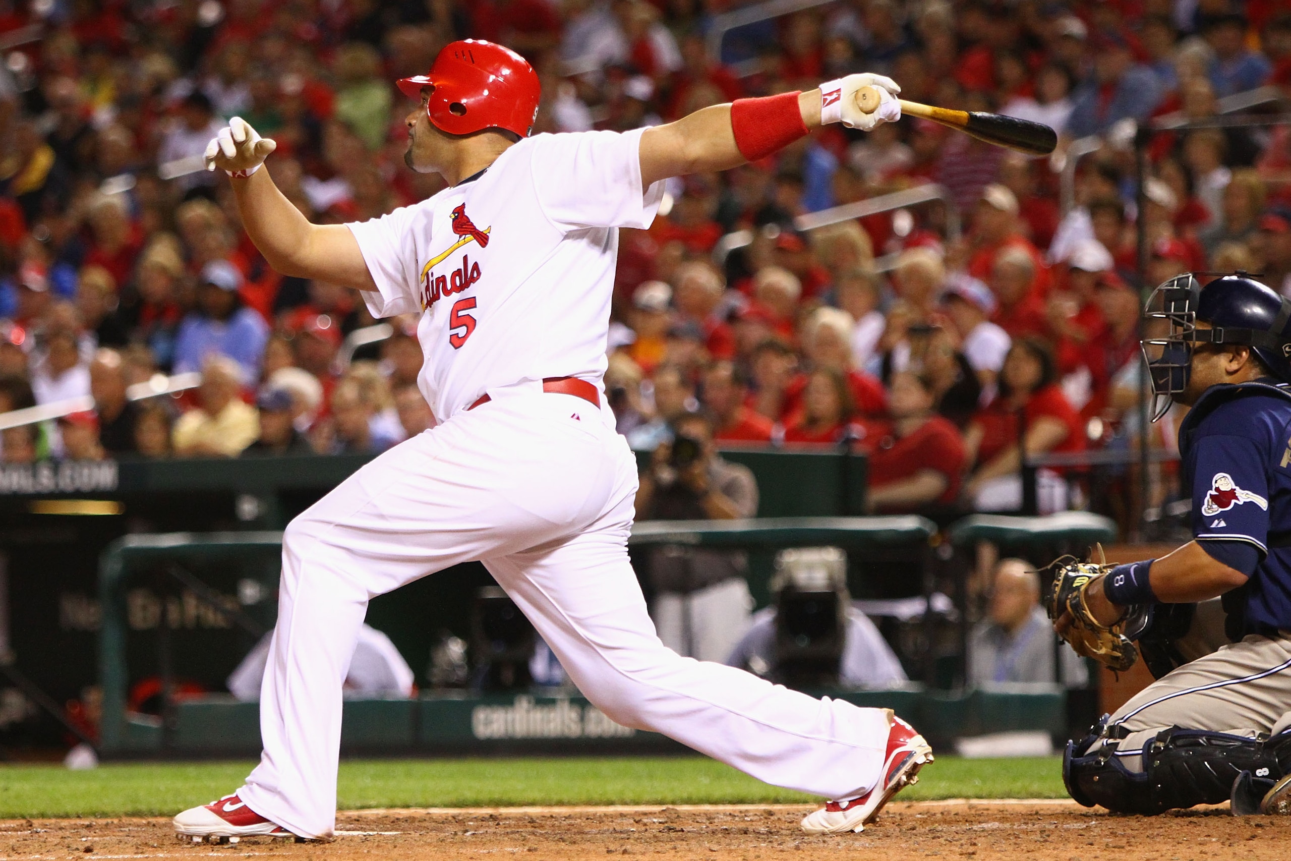 ST. LOUIS - SEPTEMBER 16: Albert Pujols #5 of the St. Louis Cardinals hits an RBI double against the San Diego Padres at Busch Stadium on September 16, 2010 in St. Louis, Missouri. (Photo by Dilip Vishwanat/Getty Images) ST. LOUIS - SEPTEMBER 16: Albert Pujols #5 of the St. Louis Cardinals hits an RBI double against the San Diego Padres at Busch Stadium on September 16, 2010 in St. Louis, Missouri. (Photo by Dilip Vishwanat/Getty Images)