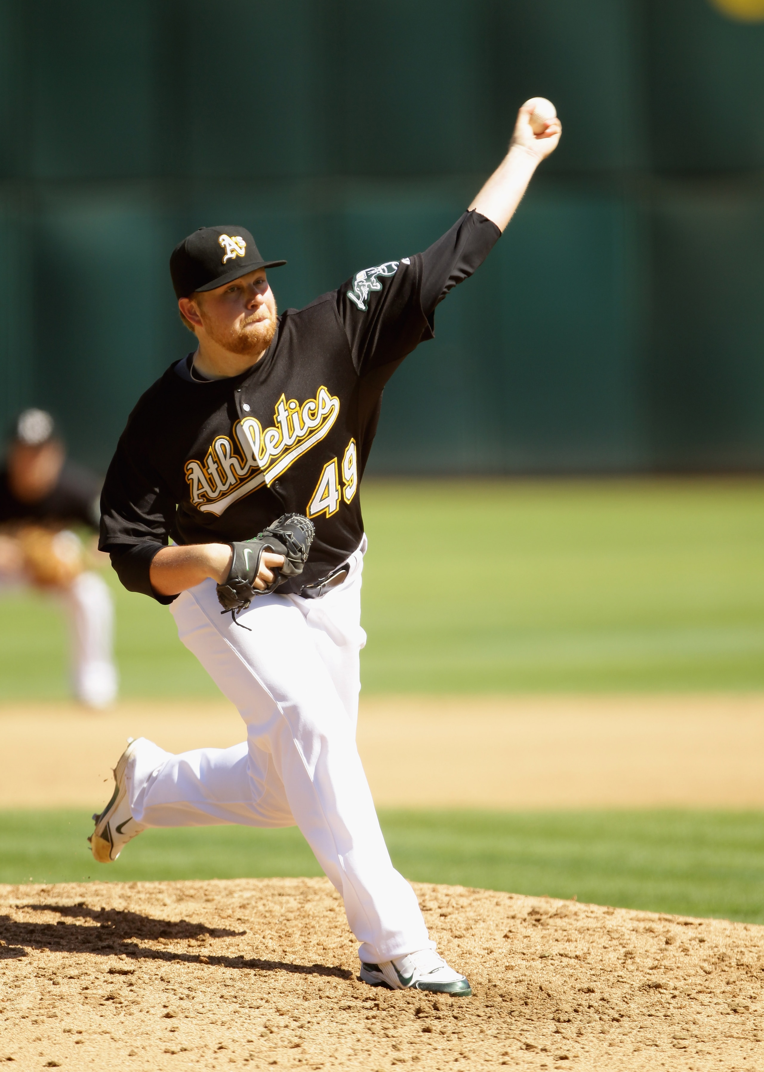 OAKLAND, CA - SEPTEMBER 22: Brett Anderson #49 of the Oakland Athletics pitches against the Chicago White Sox at the Oakland-Alameda County Coliseum on September 22, 2010 in Oakland, California. (Photo by Ezra Shaw/Getty Images) OAKLAND, CA - SEPTEMBER 22: Brett Anderson #49 of the Oakland Athletics pitches against the Chicago White Sox at the Oakland-Alameda County Coliseum on September 22, 2010 in Oakland, California. (Photo by Ezra Shaw/Getty Images)