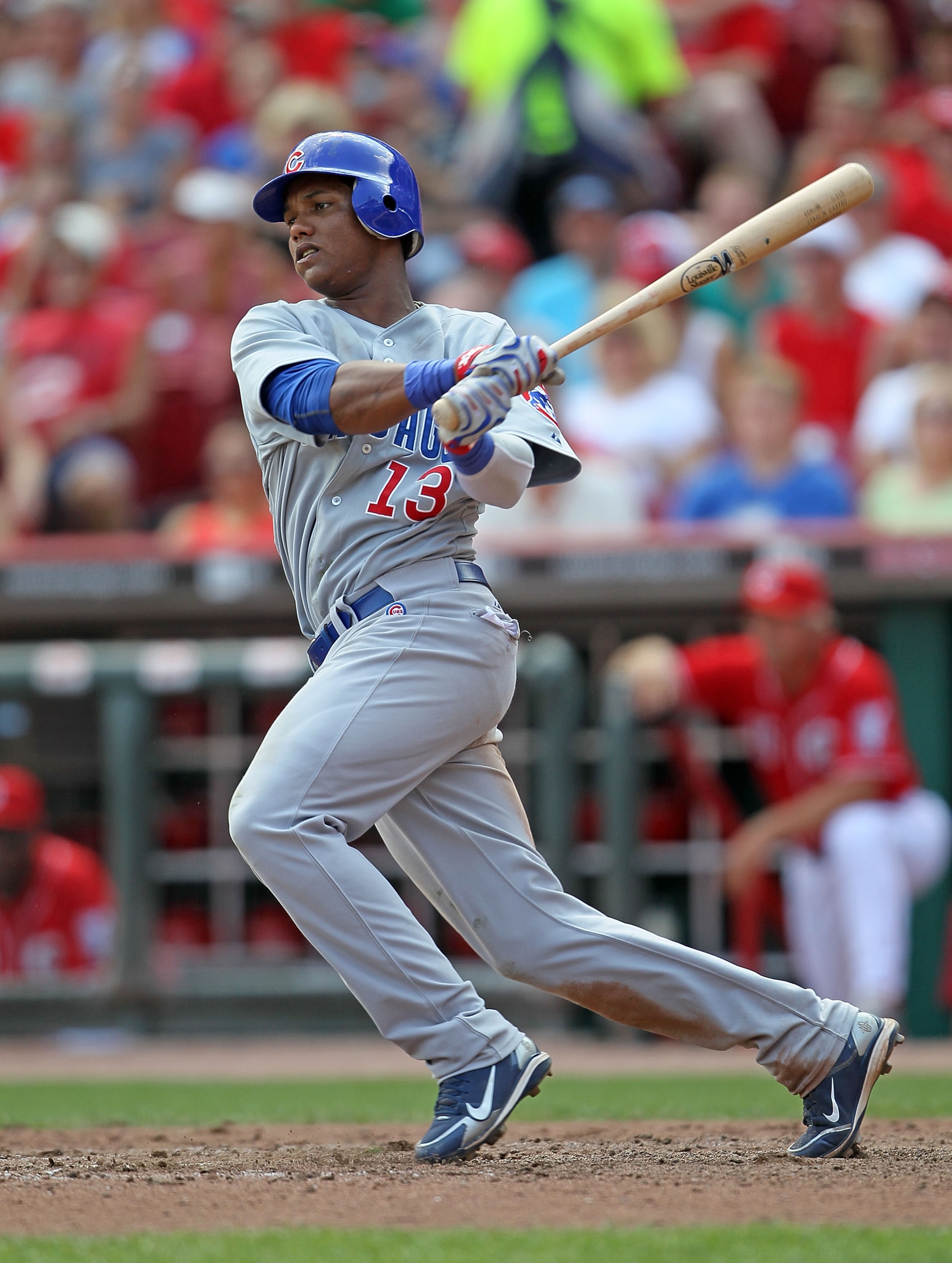 CINCINNATI - AUGUST 29:  Starlin Castro #13 of the Chicago Cubs swings at a pitch during the game against the Cincinnati Reds at Great American Ball Park on August 29, 2010 in Cincinnati, Ohio.  (Photo by Andy Lyons/Getty Images)