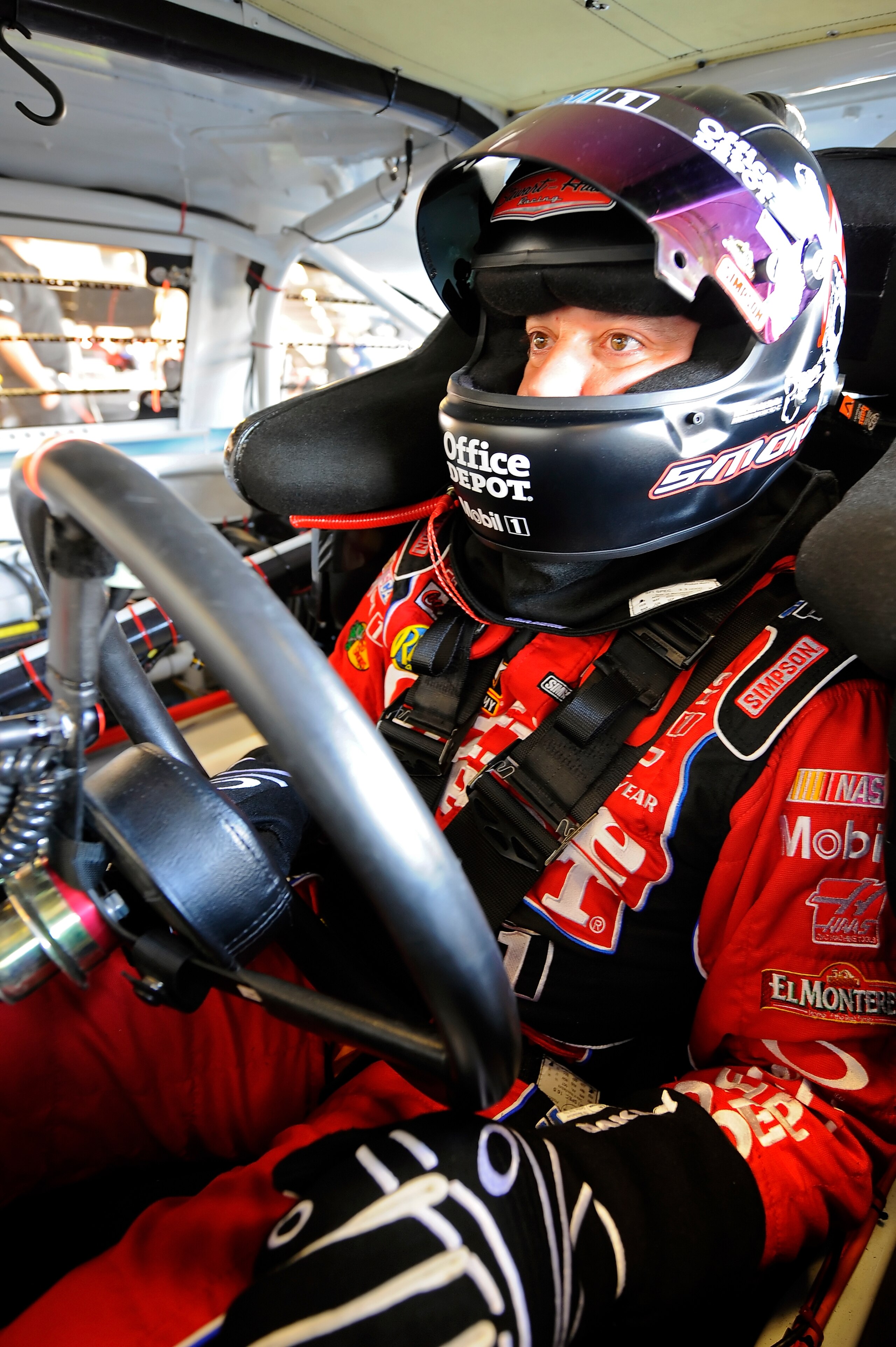 DAYTONA BEACH, FL - JANUARY 20:  Tony Stewart, driver of the #14 Office Depot Chevrolet, waits to start the test session at Daytona International Speedway on January 20, 2011 in Daytona Beach, Florida.  (Photo by Jared C. Tilton/Getty Images for NASCAR)