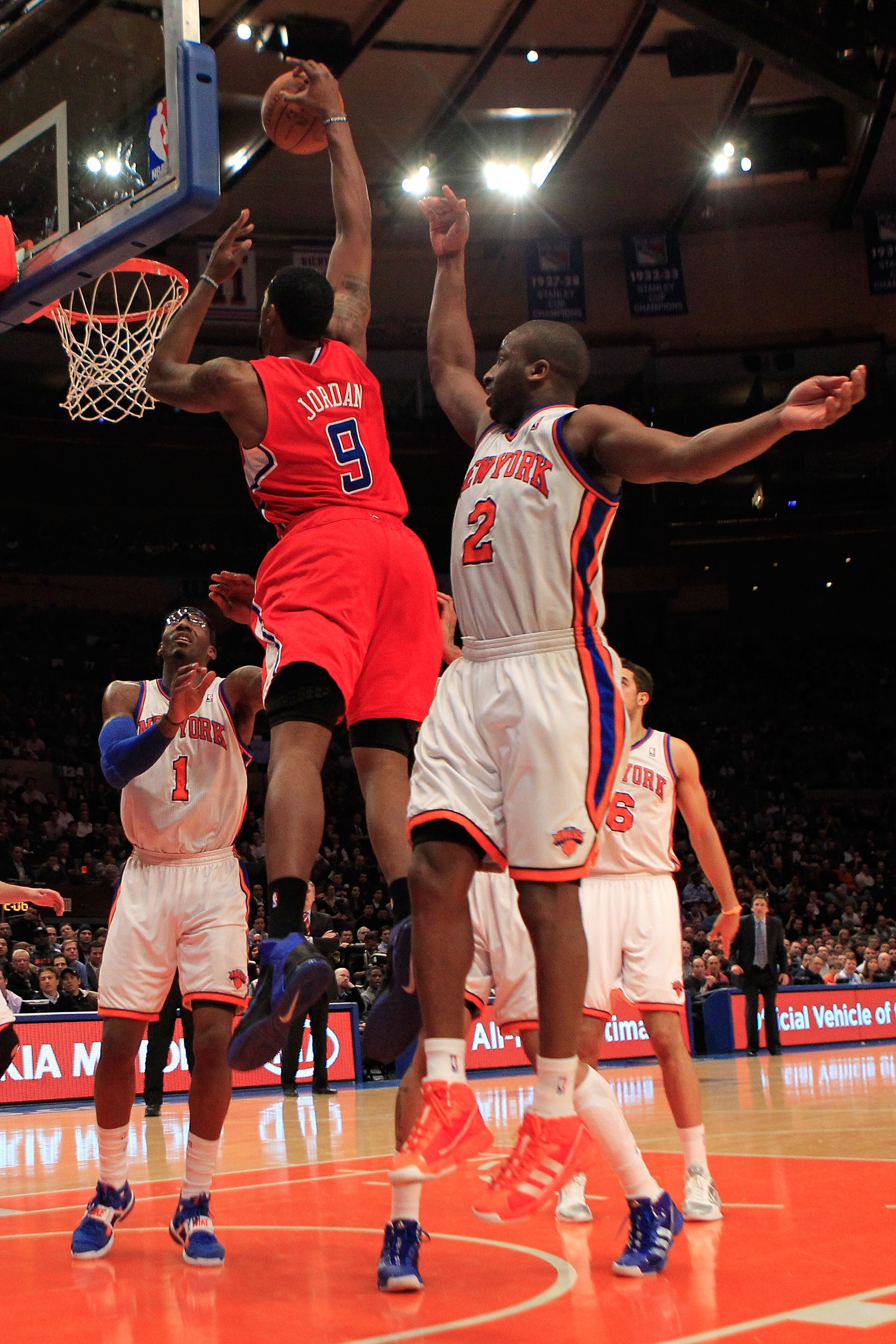 NEW YORK, NY - FEBRUARY 09:  DeAndre Jordan #9 of the Los Angeles Clippers dunks the ball over Raymond Felton #2 of the New York Knicks at Madison Square Garden on February 9, 2011 in New York City. NOTE TO USER: User expressly acknowledges and agrees tha