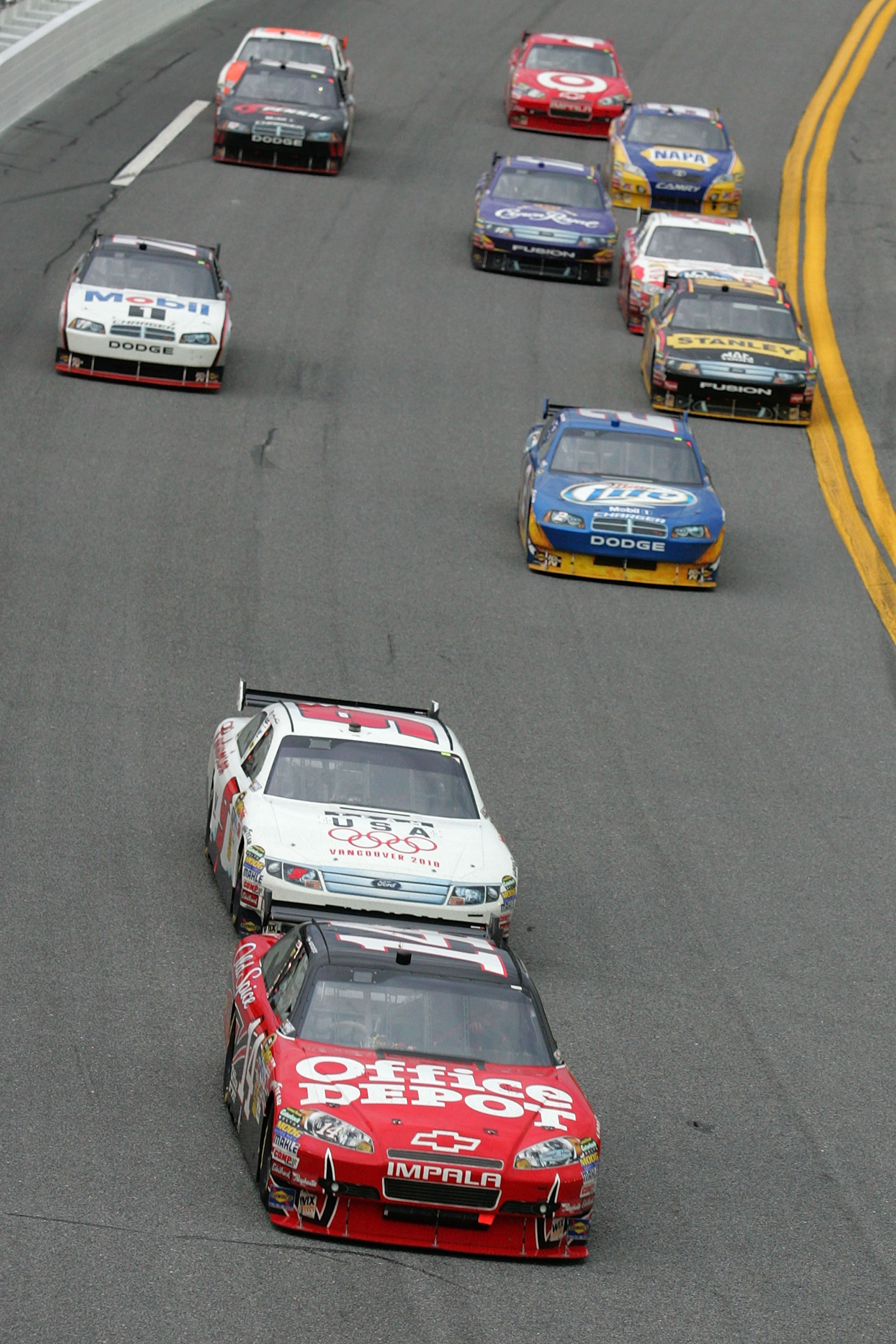 DAYTONA BEACH, FL - FEBRUARY 11:  Tony Stewart, driver of the #14 Office Depot Chevrolet, leads  Kasey Kahne, driver of the #9 Budweiser Ford, during the second NASCAR Sprint Cup Series Gatorade Duel at Daytona International Speedway on February 11, 2010